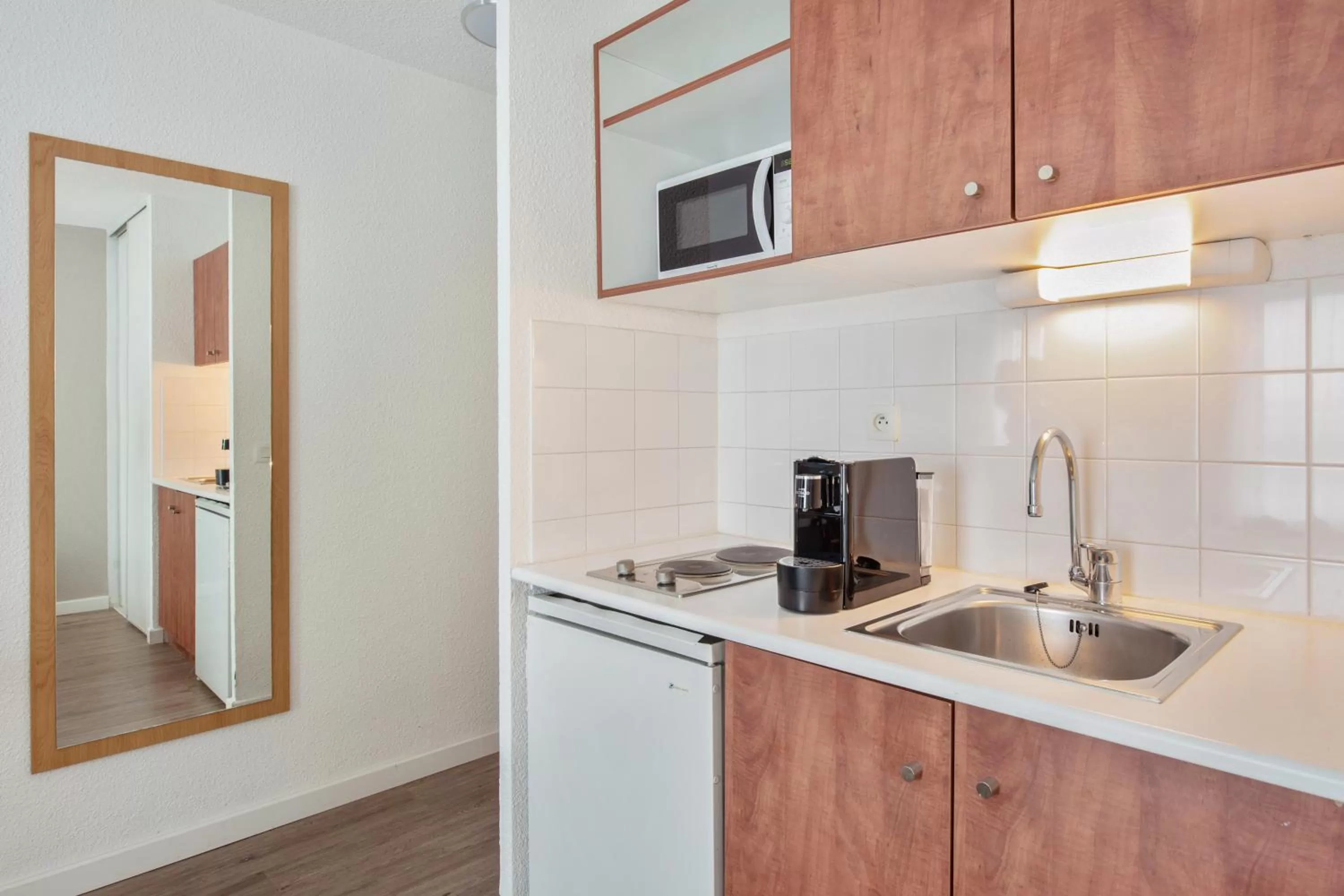 Kitchen or kitchenette in Residhotel Lyon Part Dieu