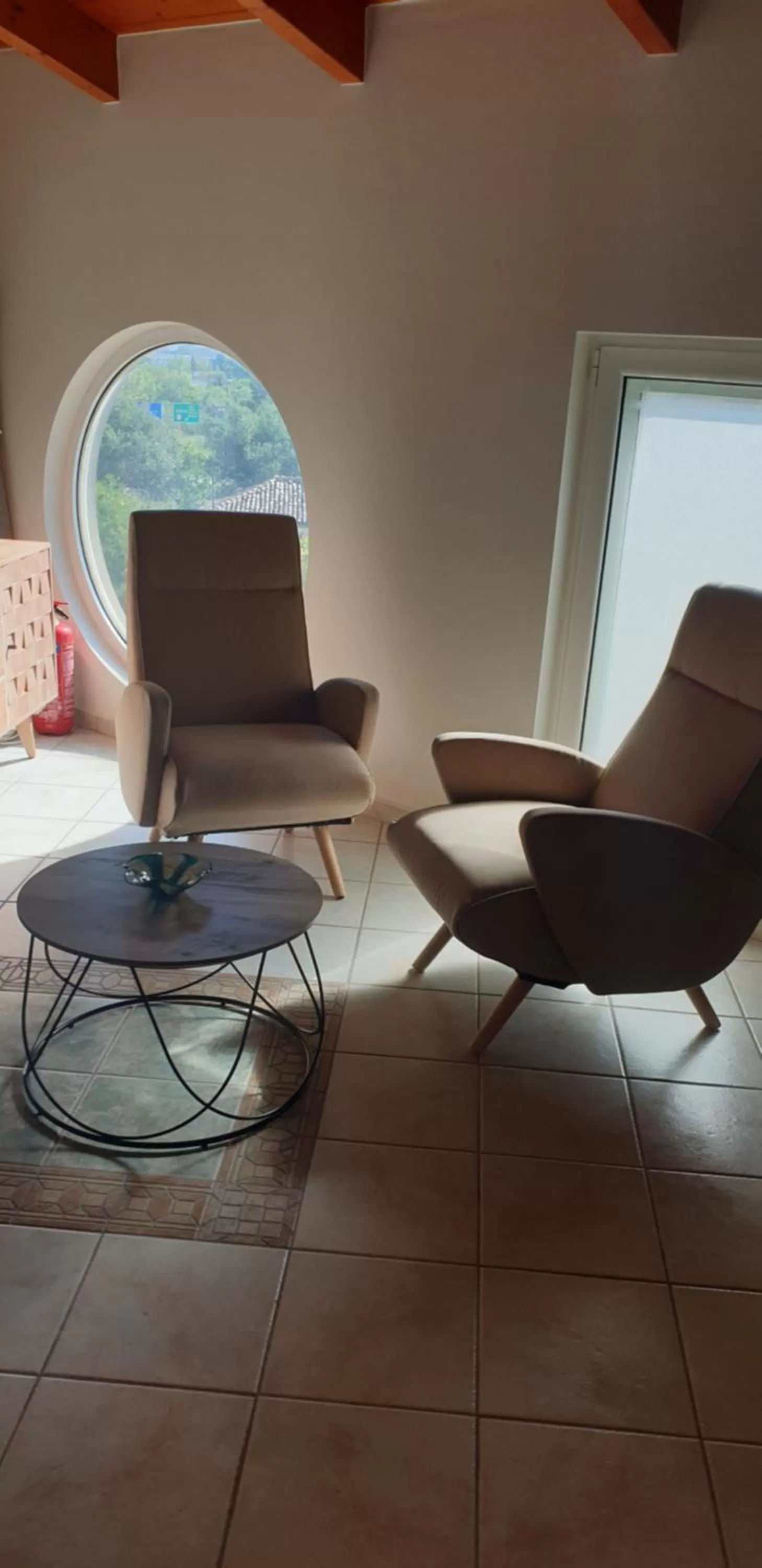 Communal lounge/ TV room in Alexia's Apartments