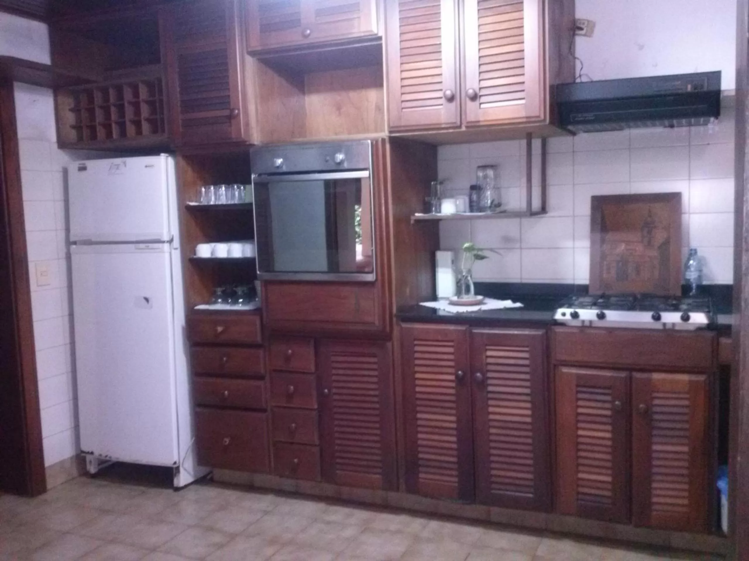 Kitchen or kitchenette in Petit Hotel Caraguata