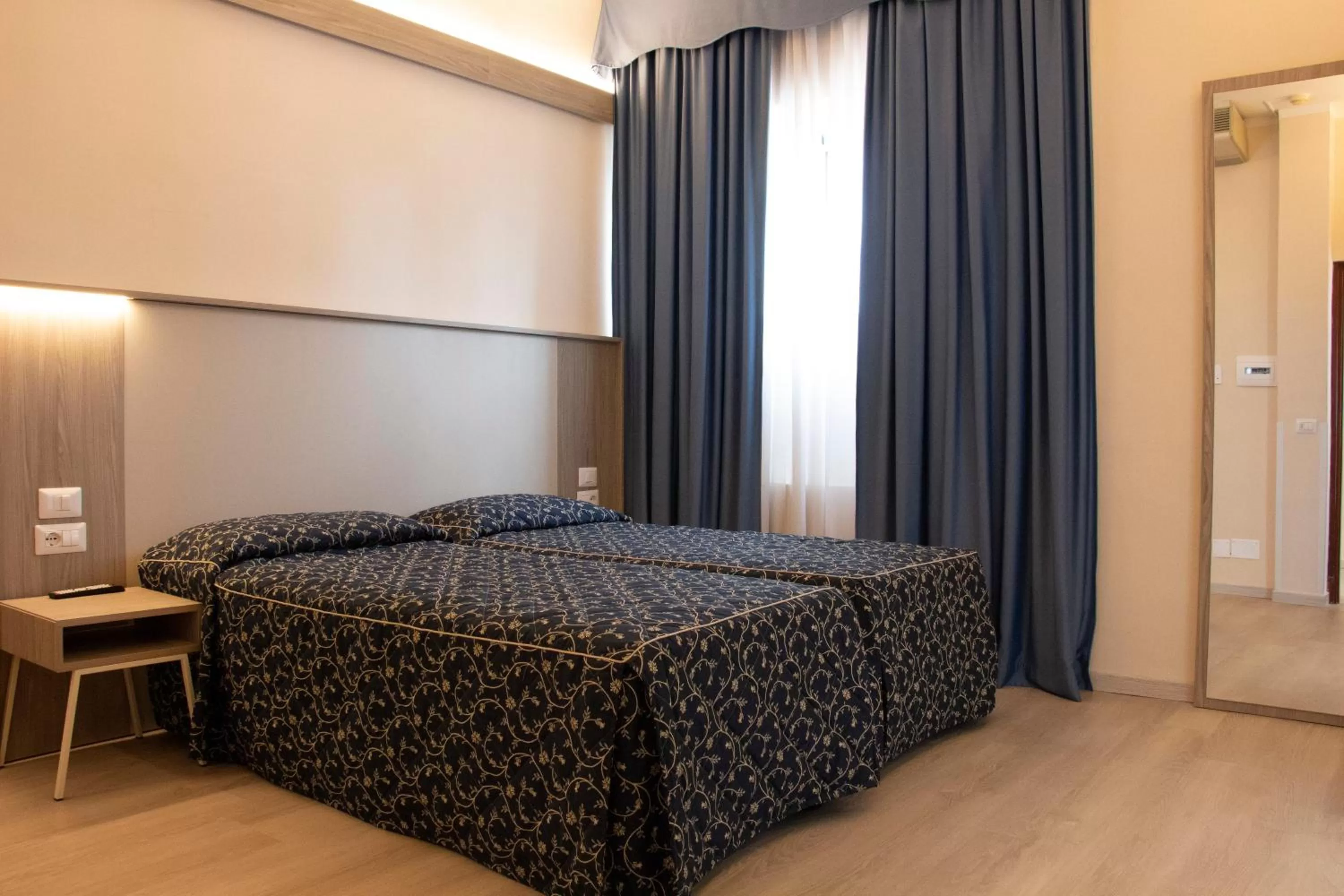 Bed in Hotel Mediterraneo