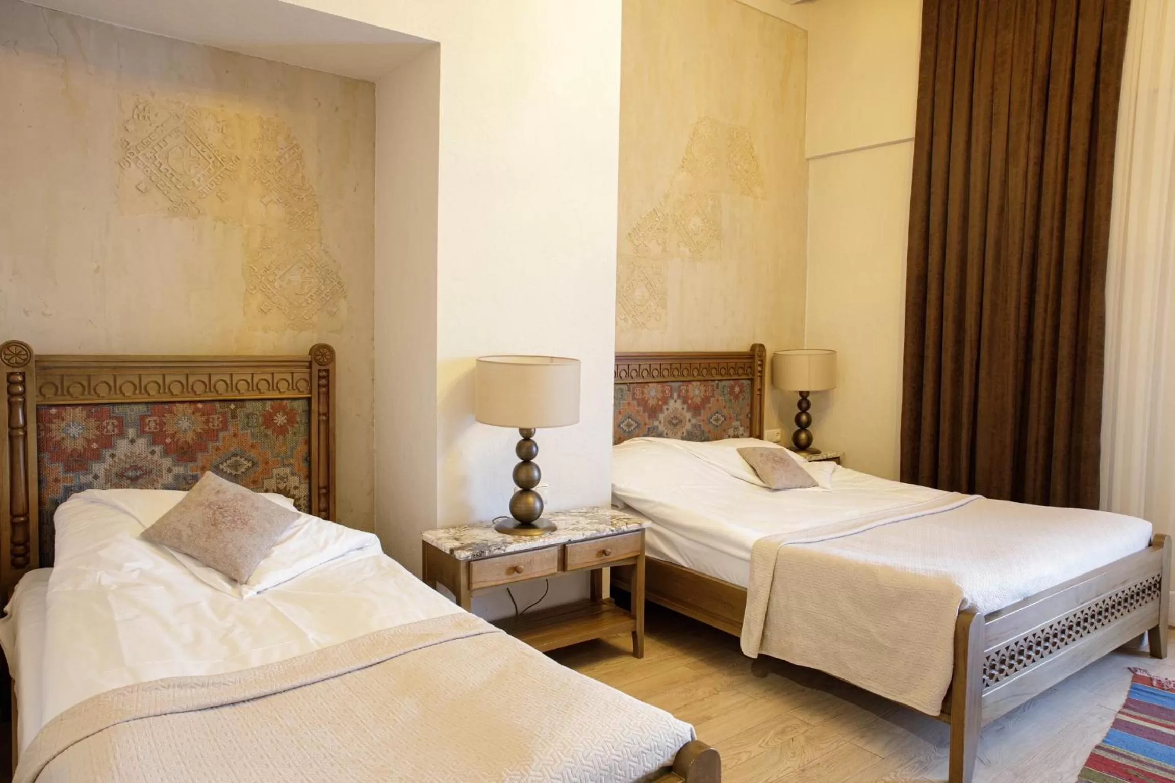 Bed in Boutique ETHNO HOTEL