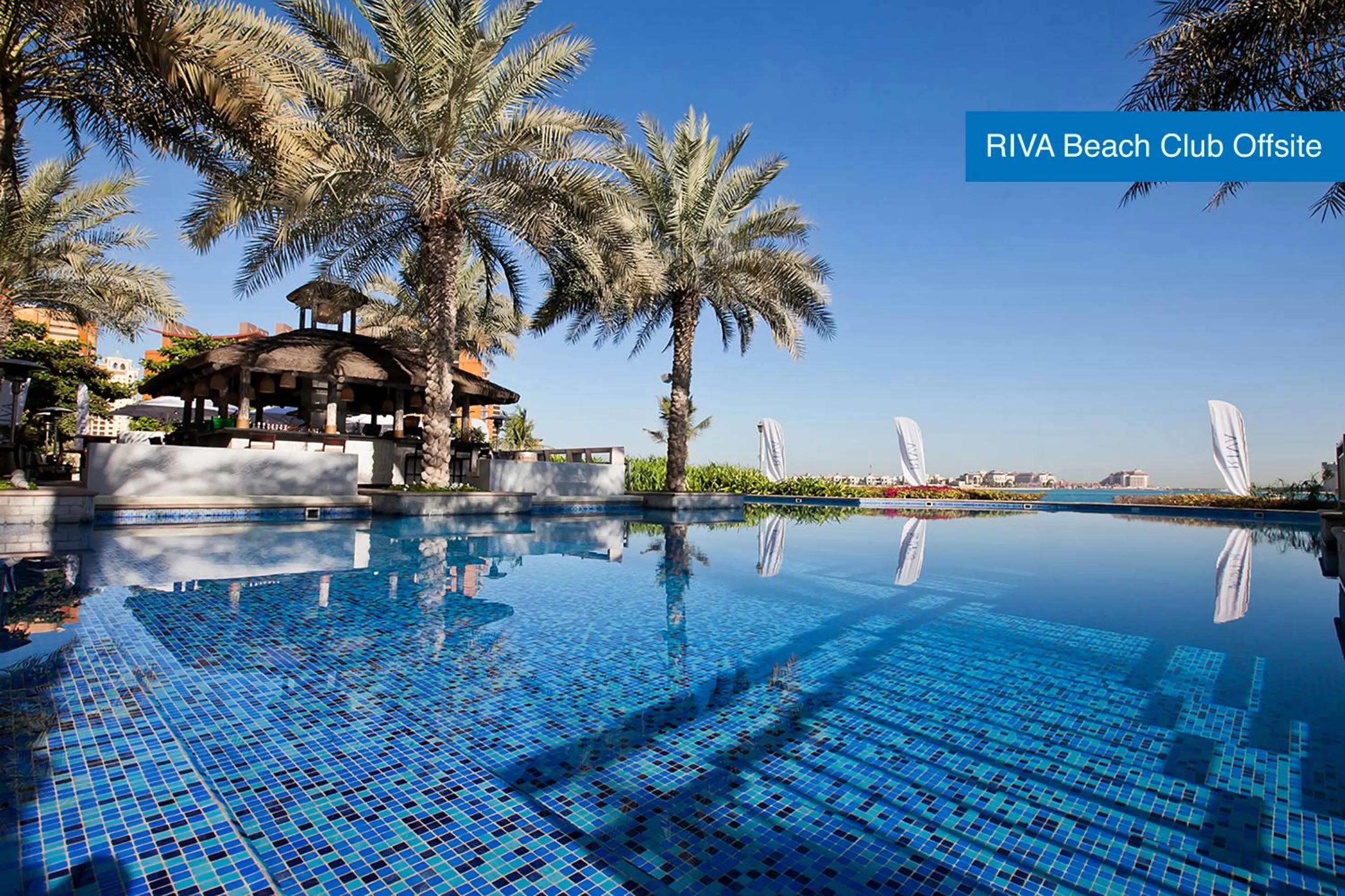 Swimming pool in Mövenpick Hotel Jumeirah Lakes Towers Dubai