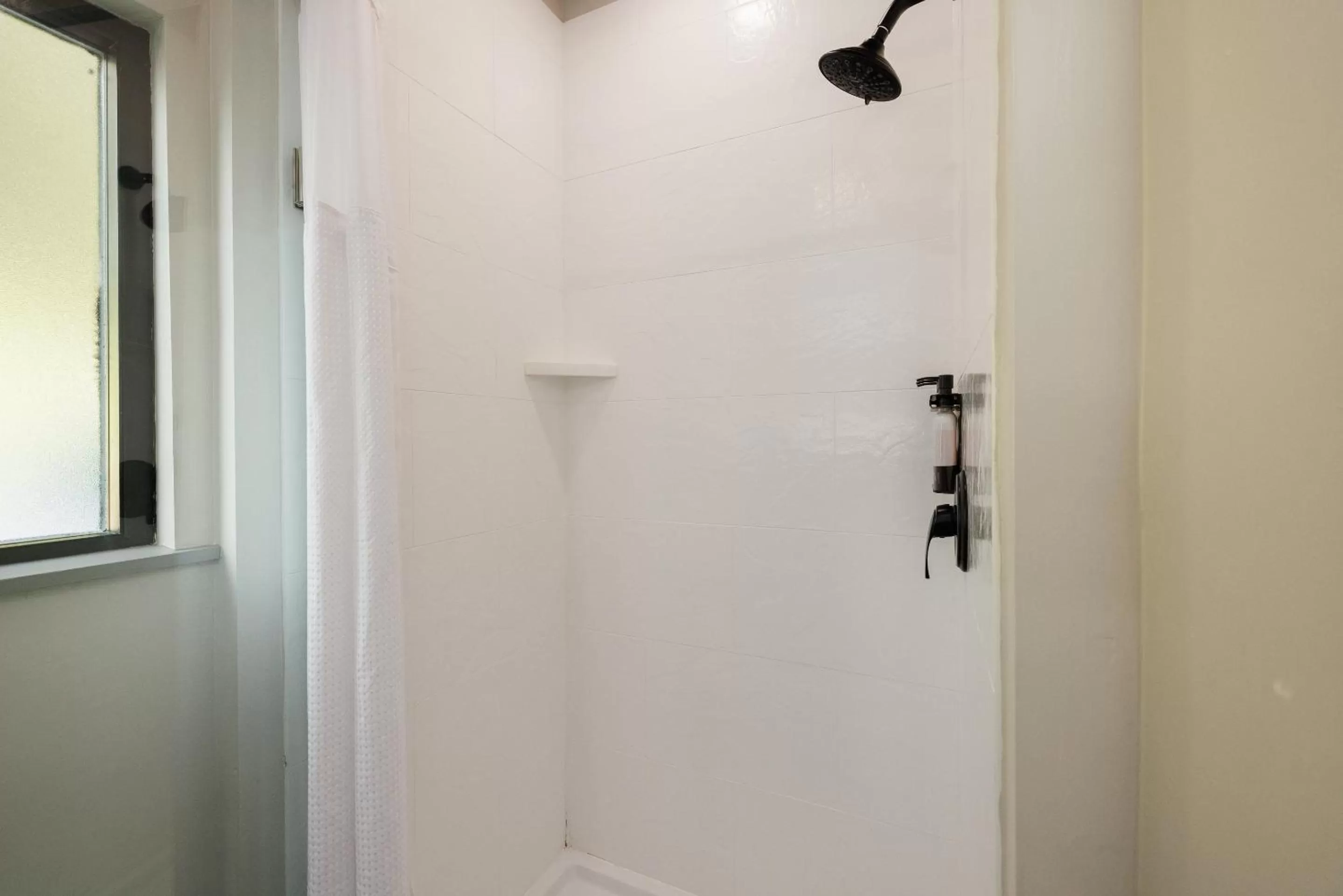 Bathroom in Inn Marin and Suites, an Ascend Collection Hotel