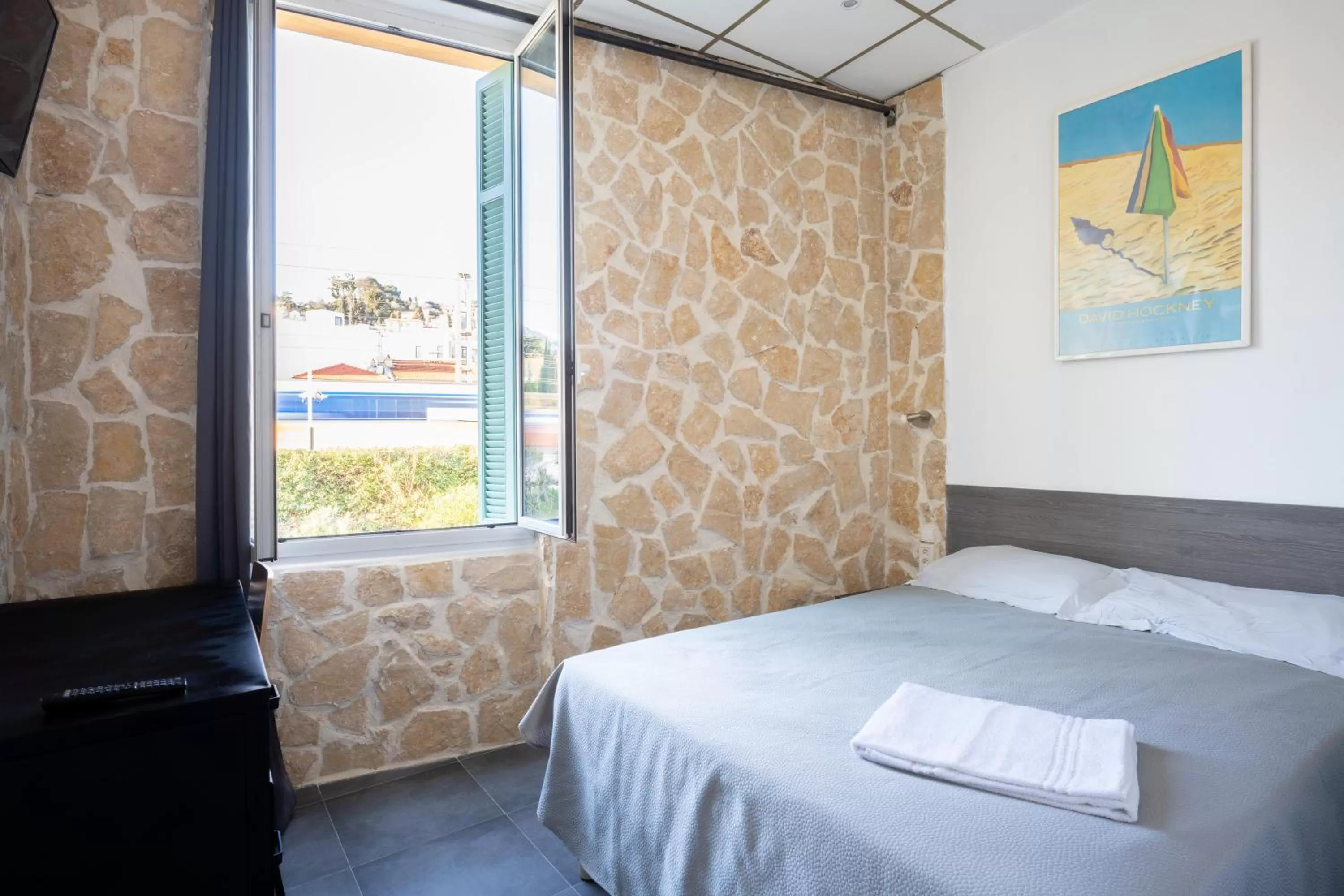 Bed in Hotel De Belgique à Menton