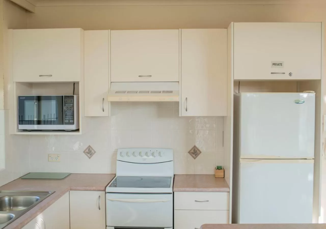 Kitchen or kitchenette in Foreshore Beachfront Apartments