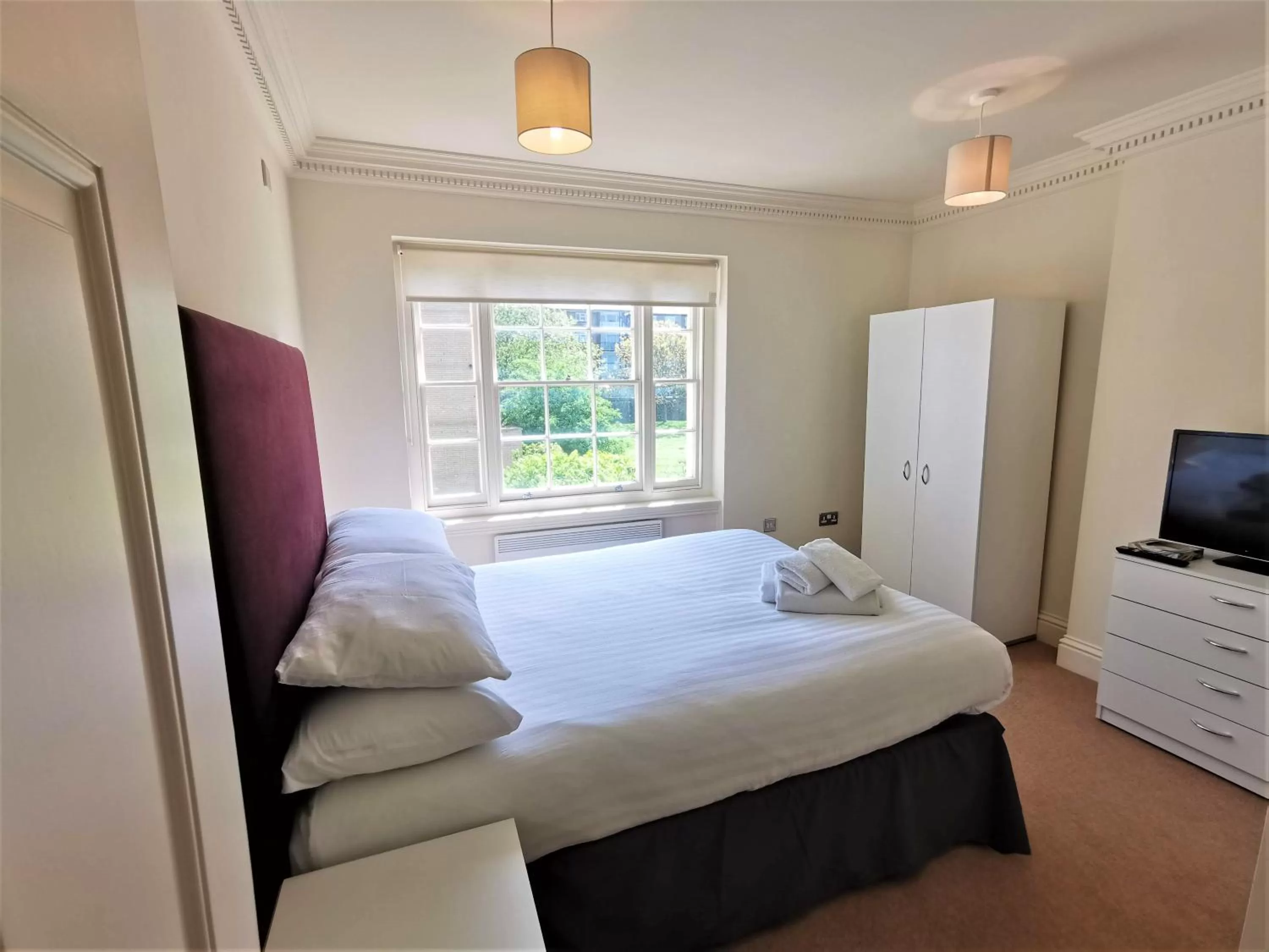 Bed in The Clarendon Royal Community