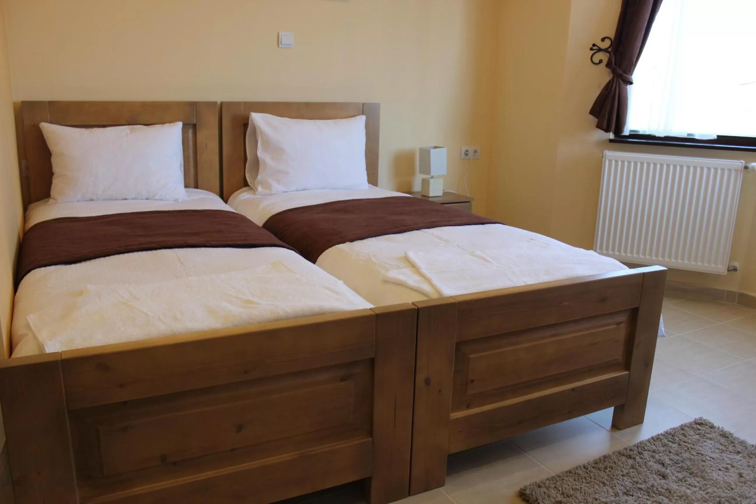 Bed in Alice Panzió Gold