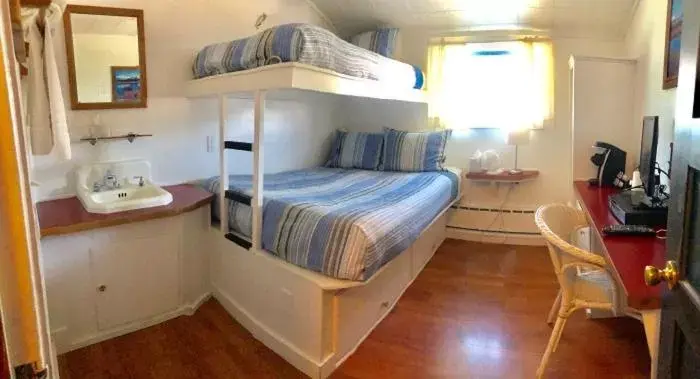 Inn - European Style Room # 4 (Shared Bath) 1 double bed with twin bunk above (upstairs) in Driftwood Inn Inn - European Style Room # 4 (Shared Bath) 1 double bed with twin bunk above (upstairs) in Driftwood Inn