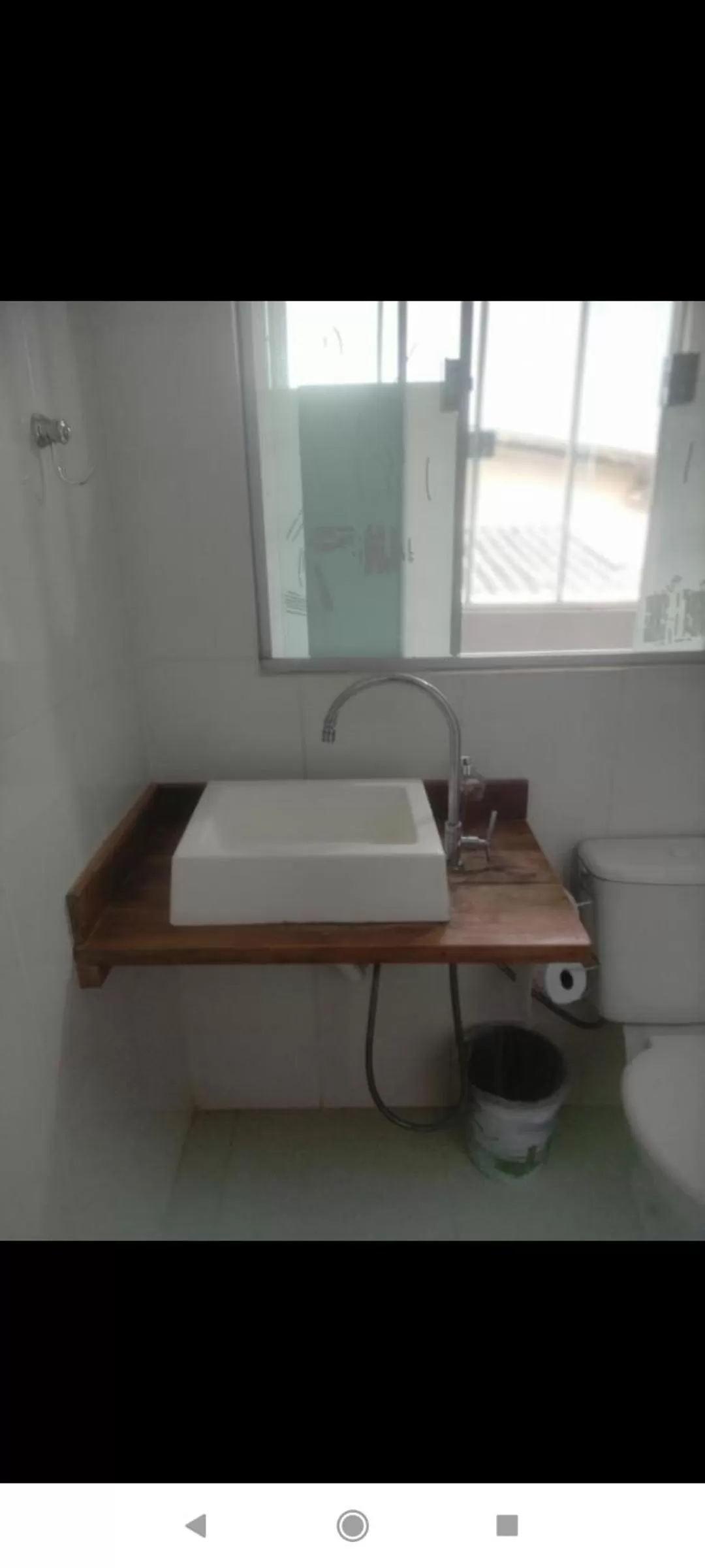 Bathroom in Pousada da Gi Suítes e Turismo