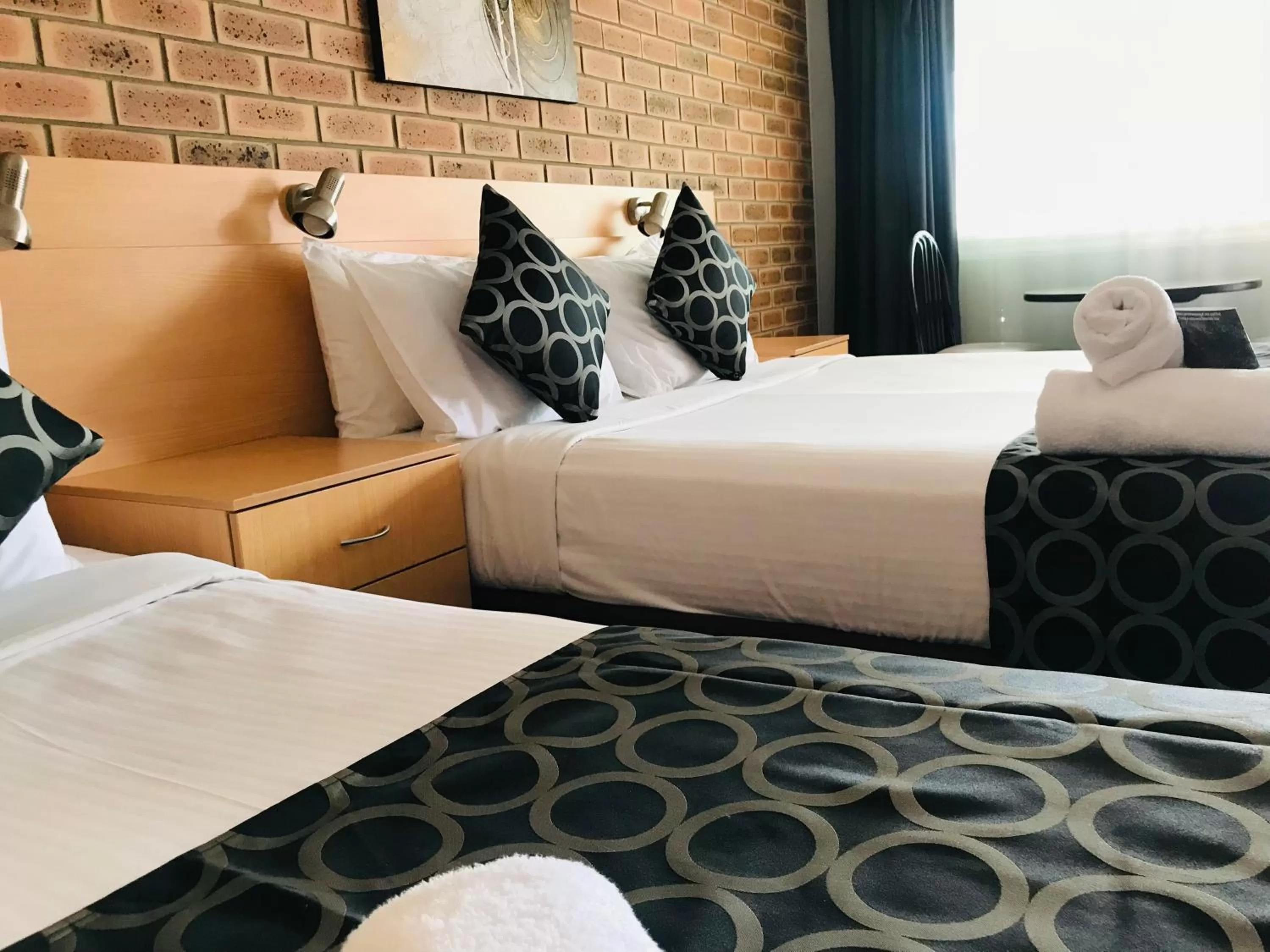 Bed in Jumbuck Motor Inn