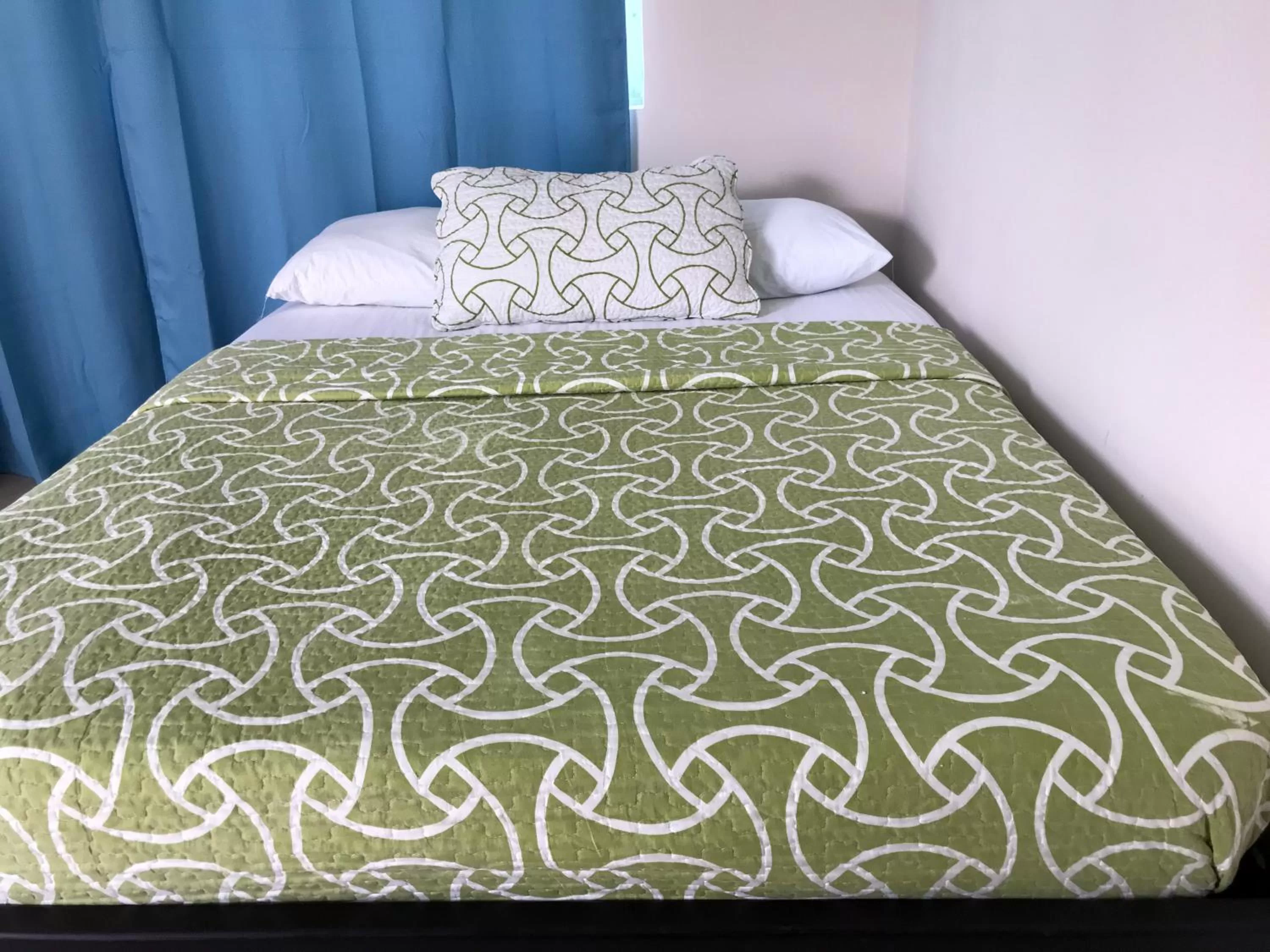 Bed in Caribbean Island Hotel Piso 2