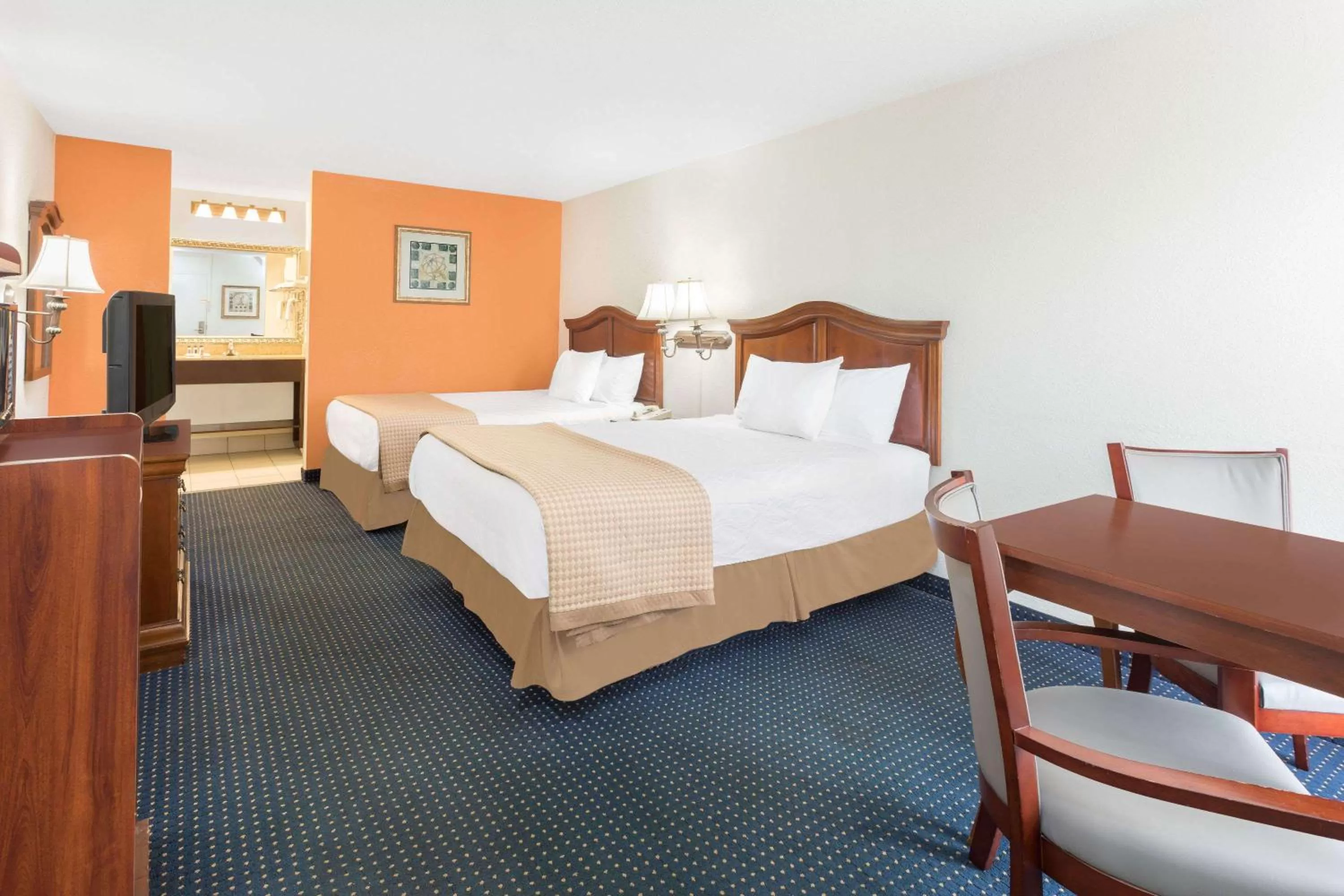 Photo of the whole room, Bed in Baymont by Wyndham Rocky Mount I-95