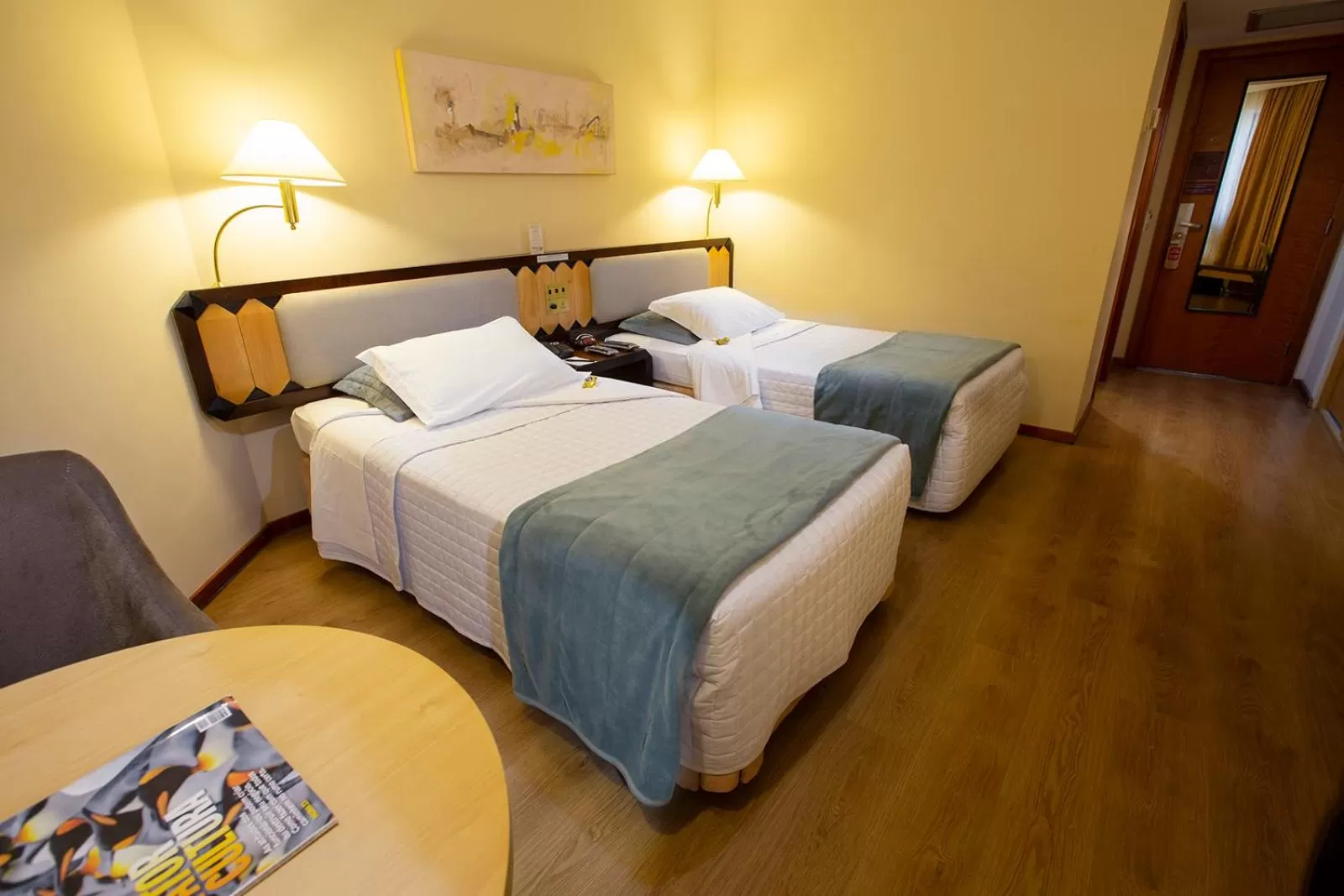 Bed in Golden Tower Pinheiros by Fênix Hotéis