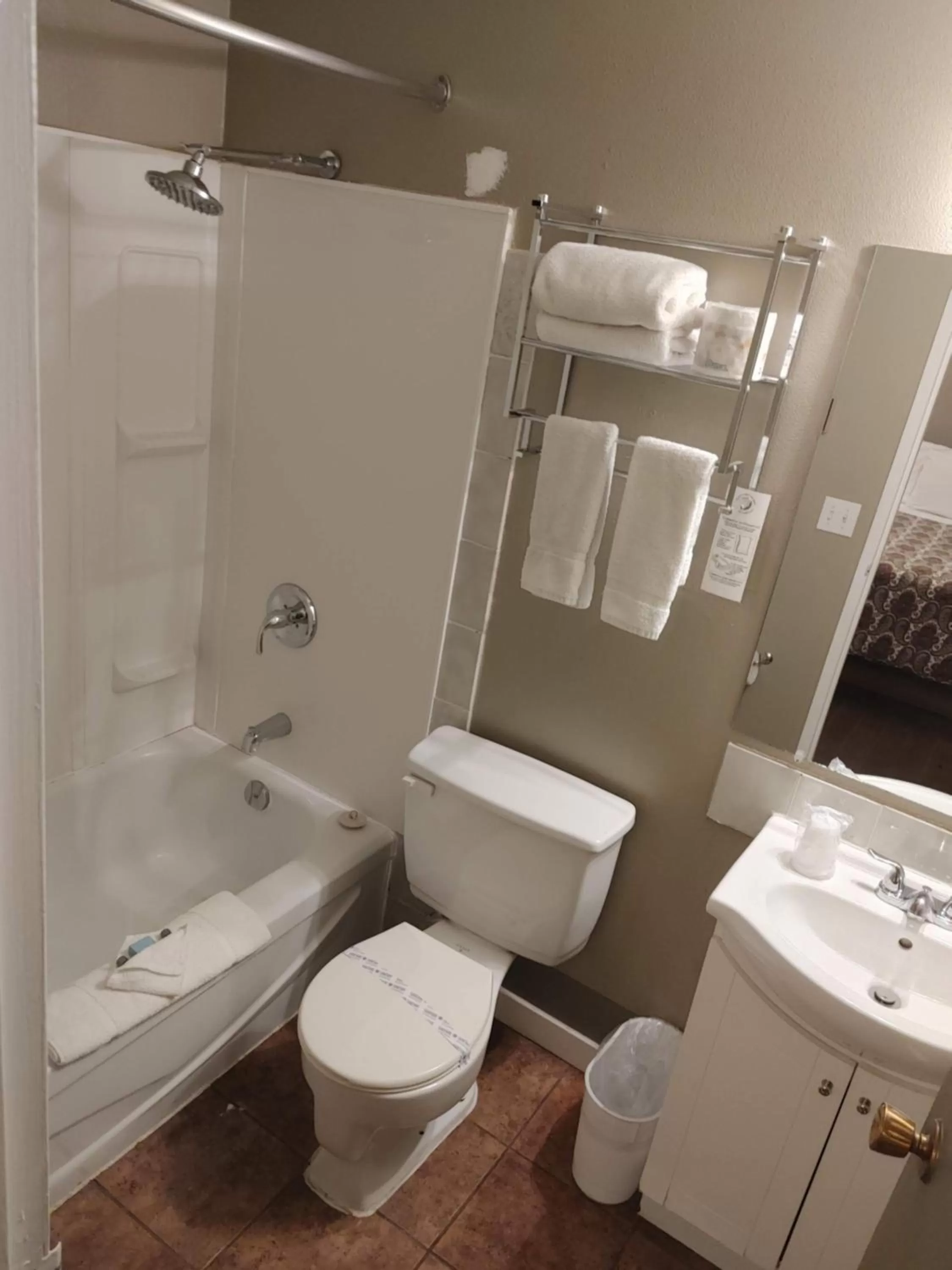 Toilet in Magnuson Hotel Creston