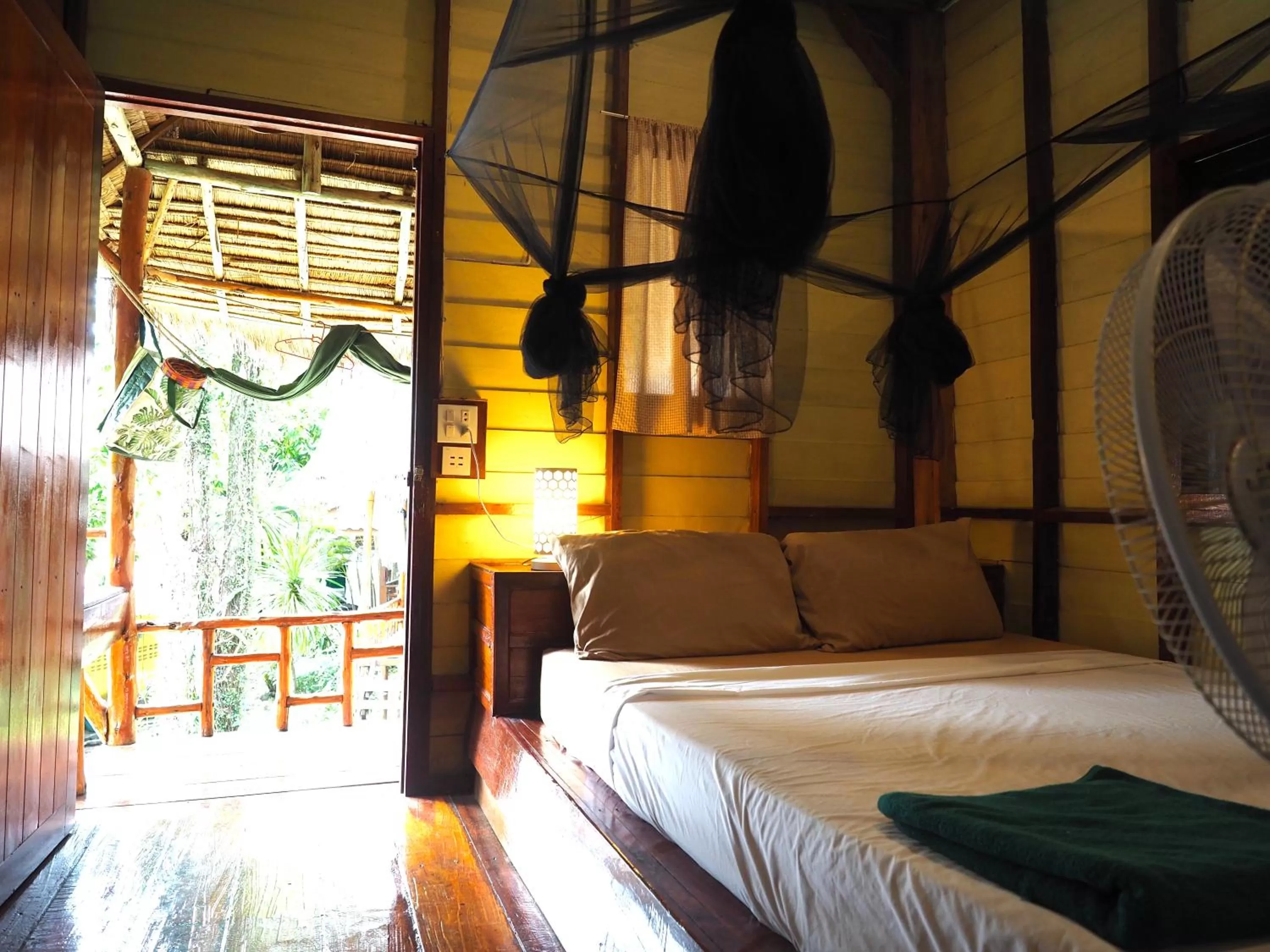 Bed in LITTLE EDEN Bungalows