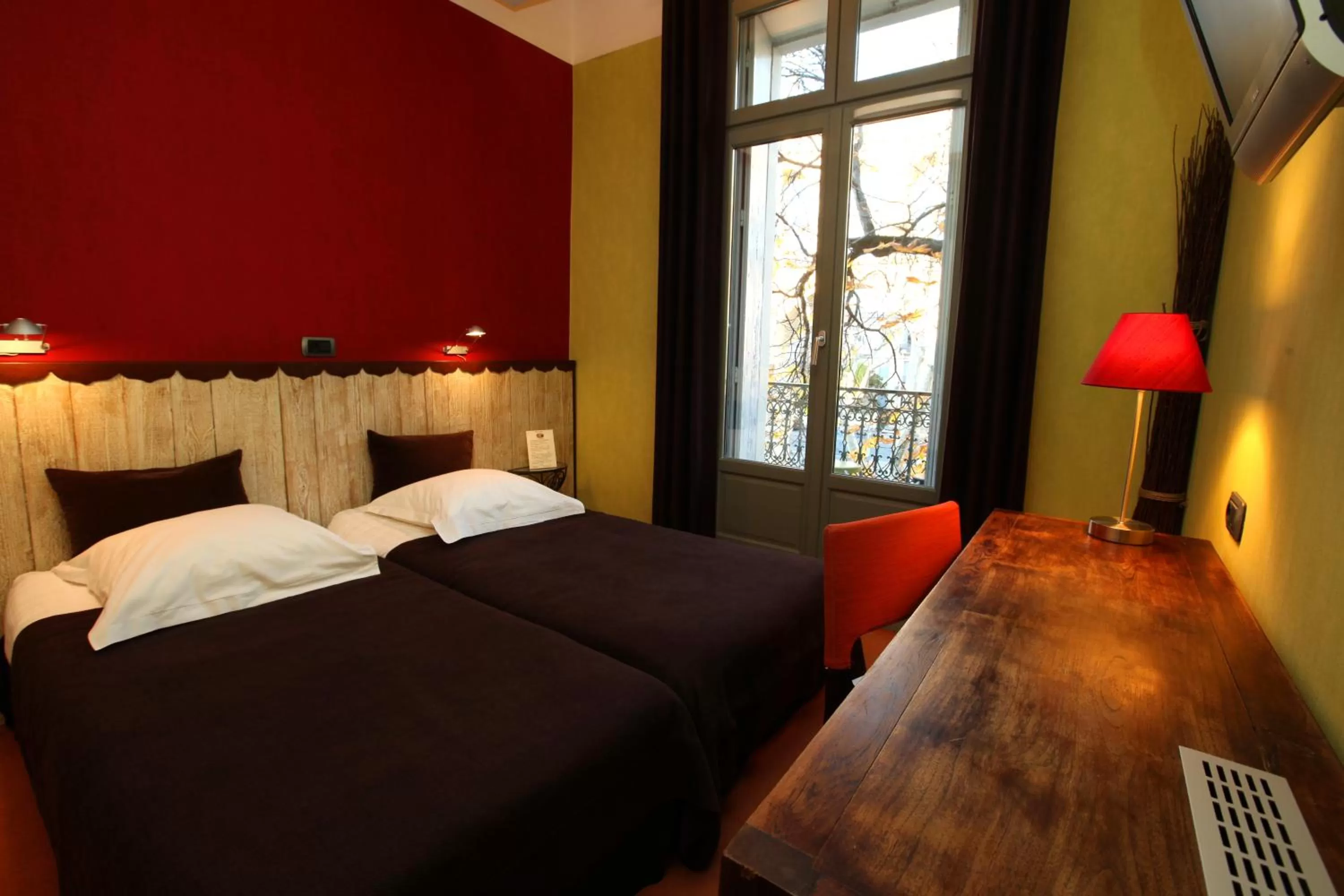 Bed in Hotel des Arceaux