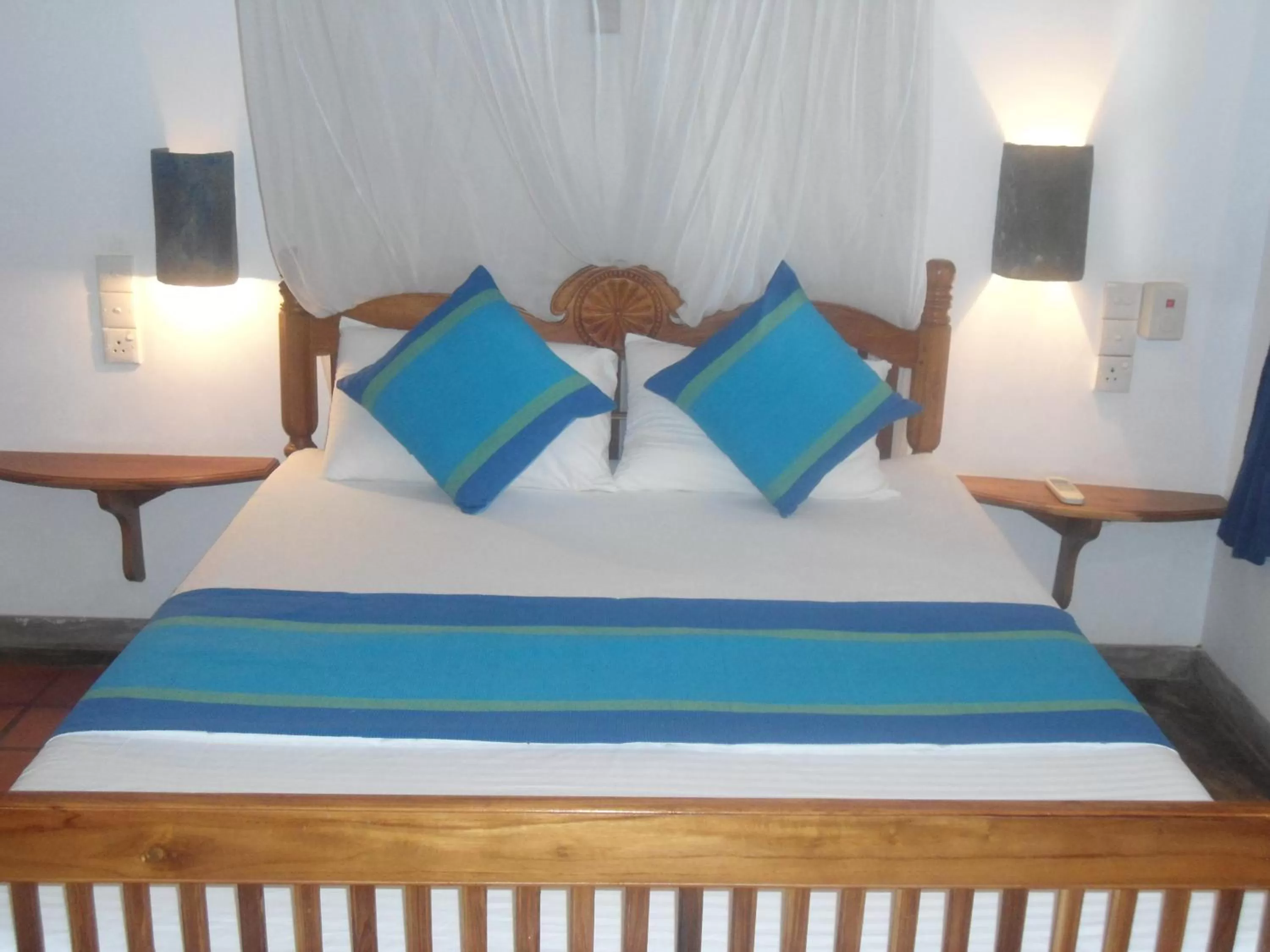 Bed in Little Paradise Tourist Guest House and Holiday Home