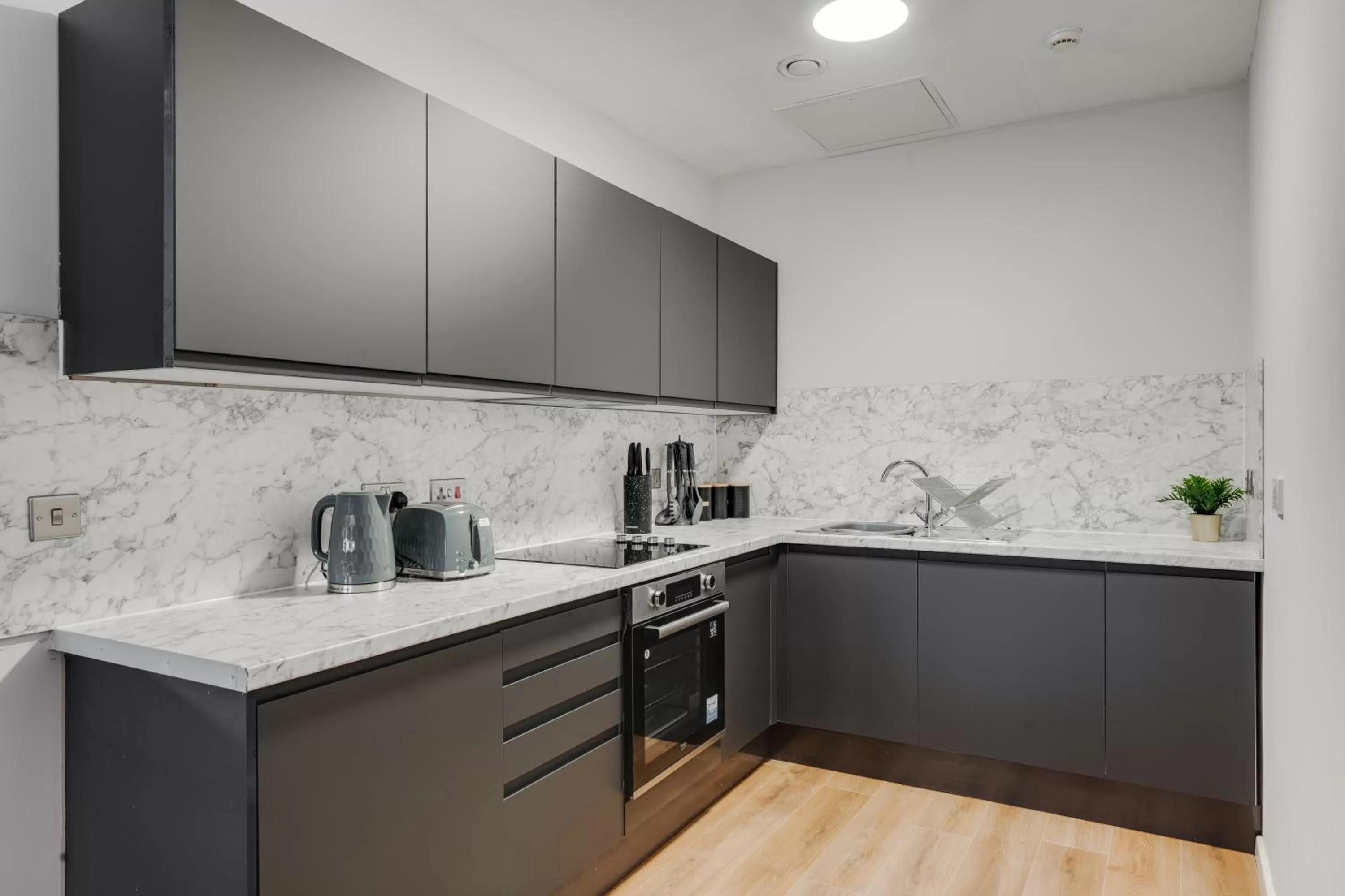Kitchen or kitchenette in Stanley St Suites By GuestFirst