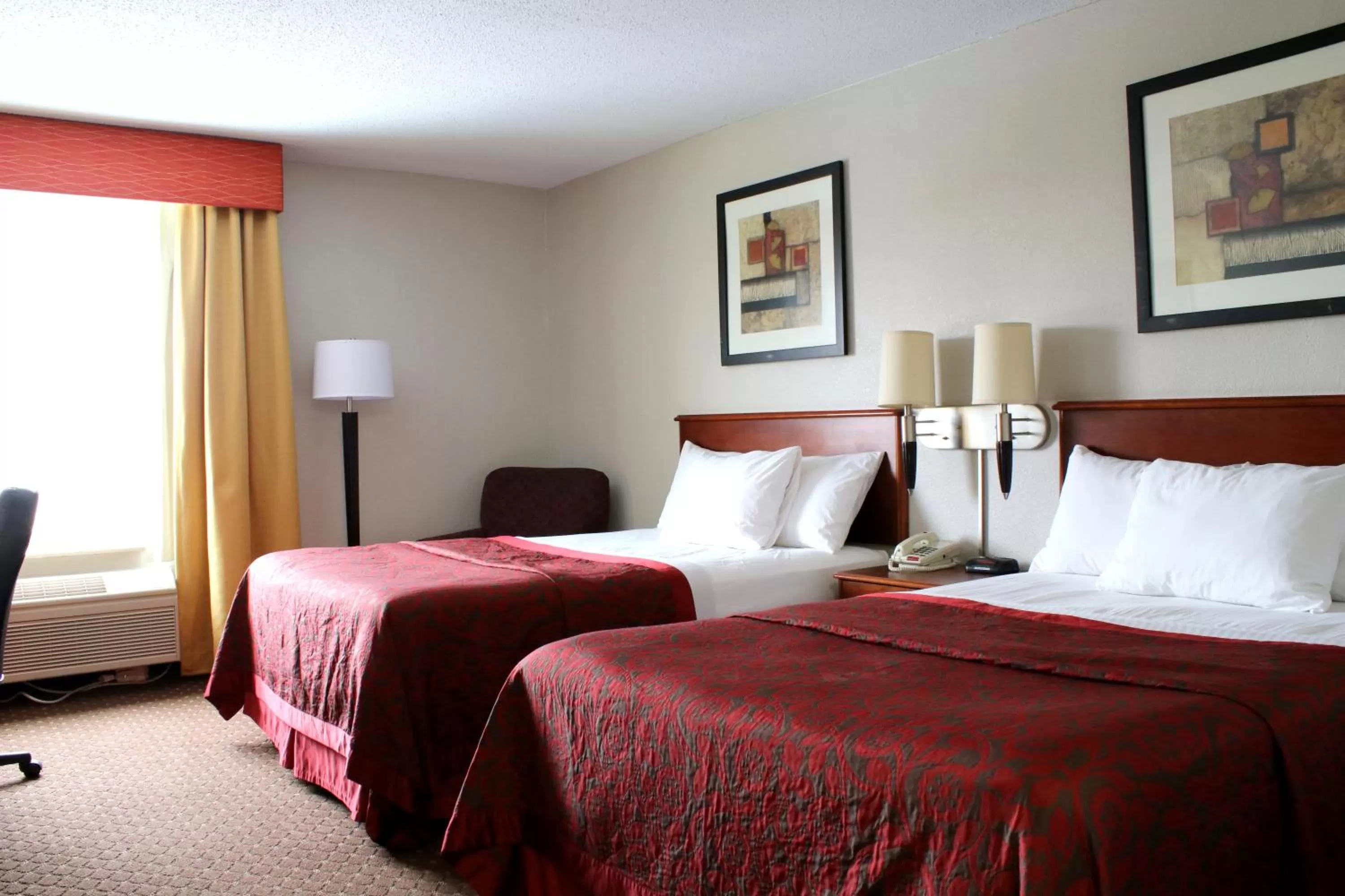 Photo of the whole room, Bed in Days Inn & Suites by Wyndham Bloomington/Normal IL