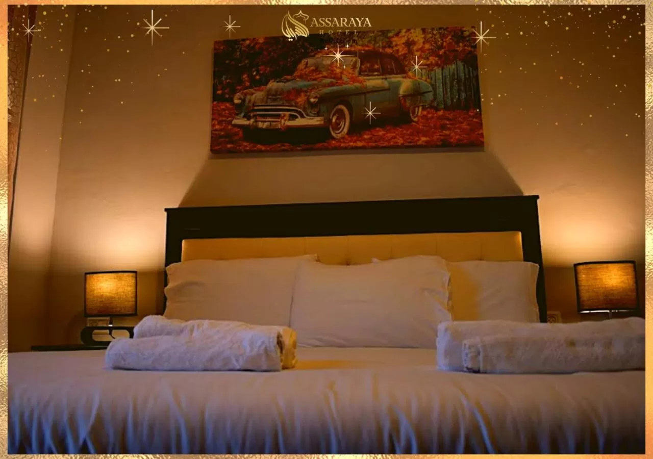 Bed in Assaraya Palace Hotel