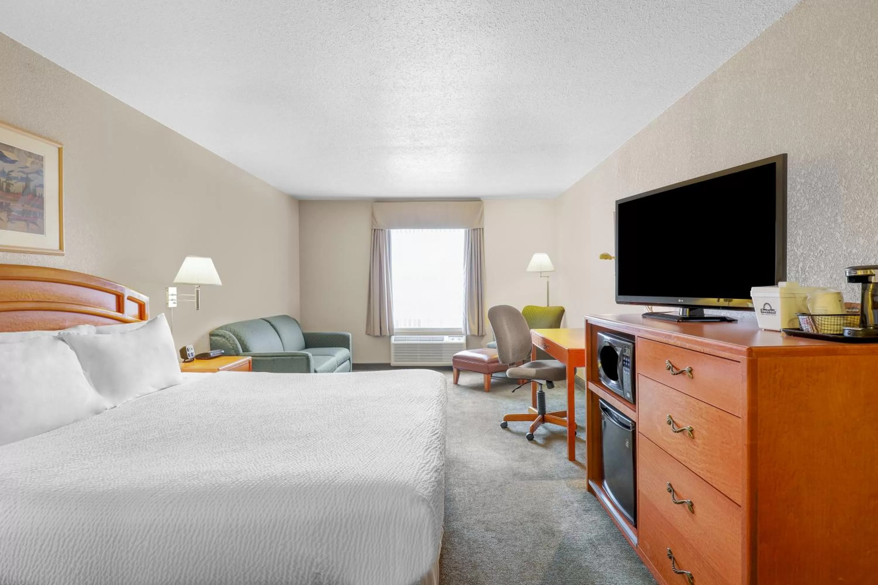 Bedroom, Bed in Days Inn by Wyndham Red Deer
