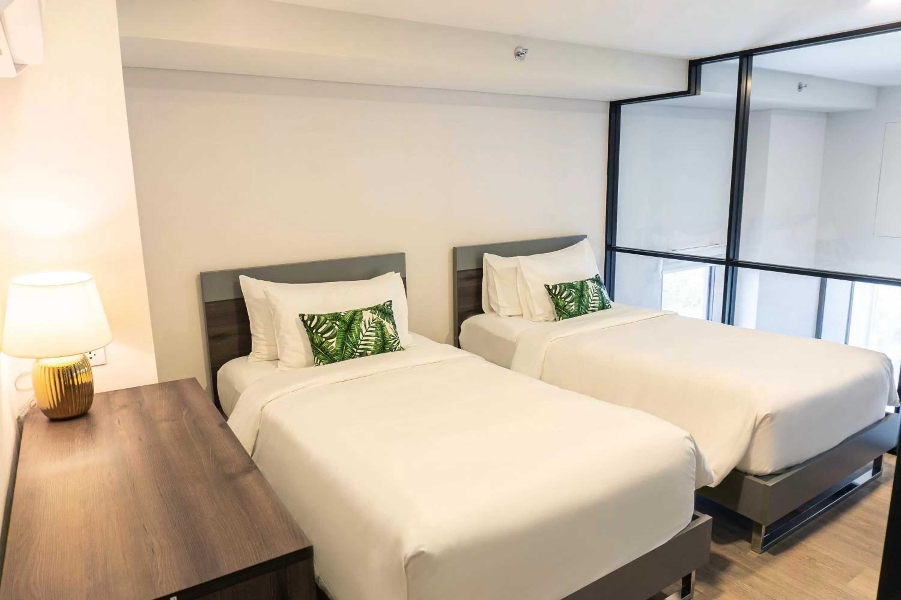 Bed in Ramada By Wyndham Bangkok Sukhumvit 87