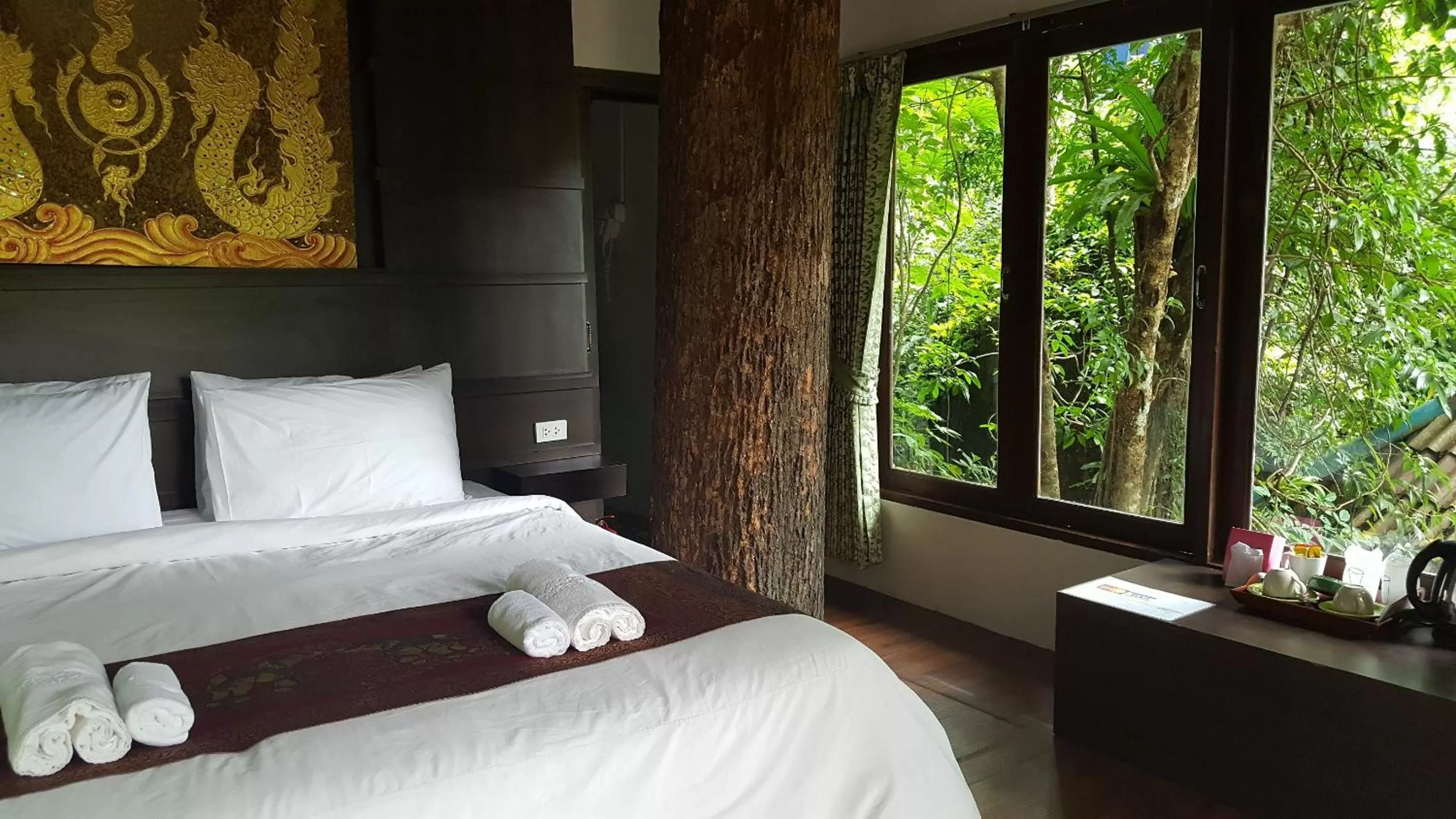 Photo of the whole room, Bed in Rock and Tree House Resort