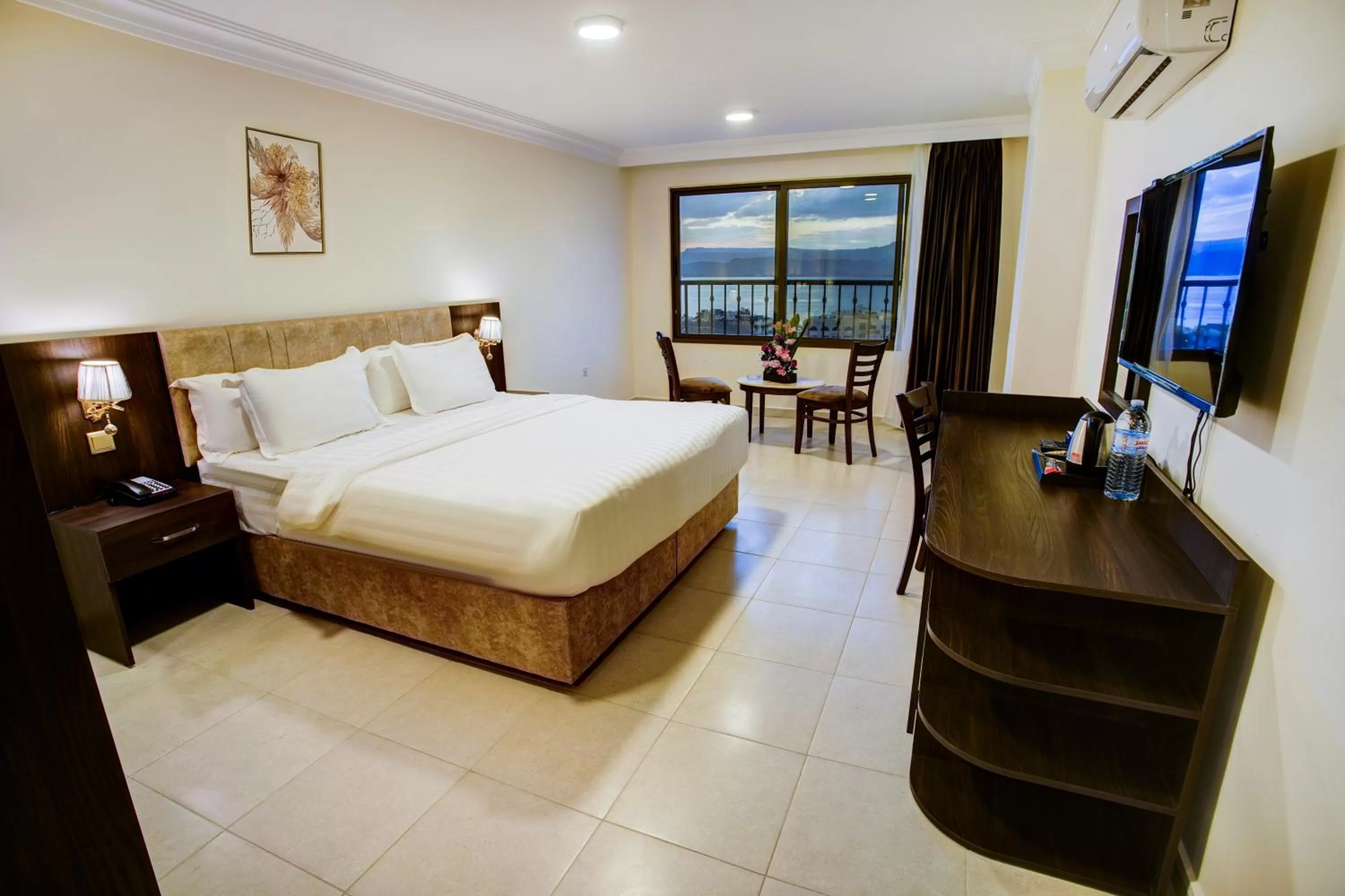 Bed in AQABA COAST HOTEL