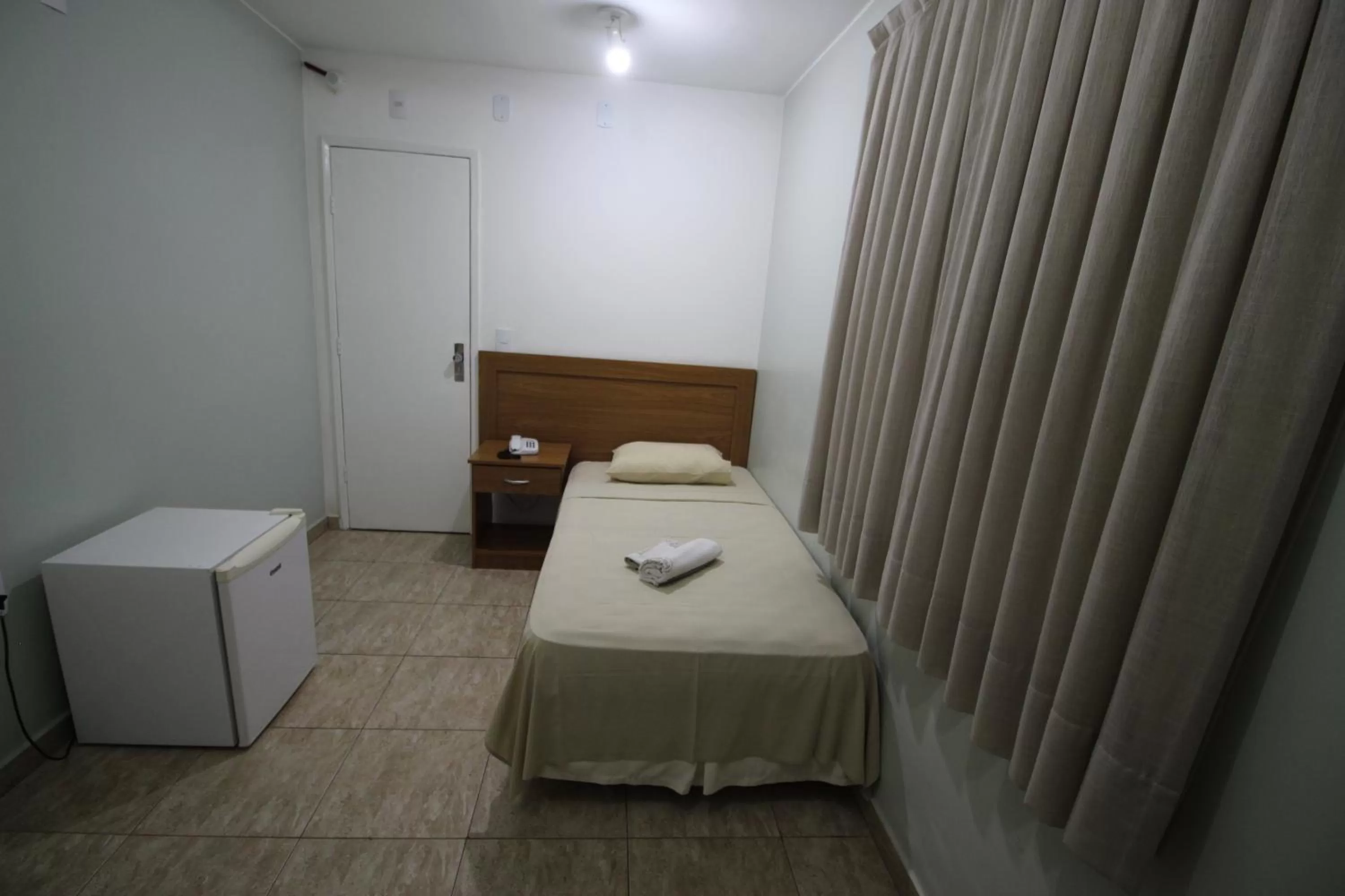 Photo of the whole room, Bed in Hotel Regina Muriaé