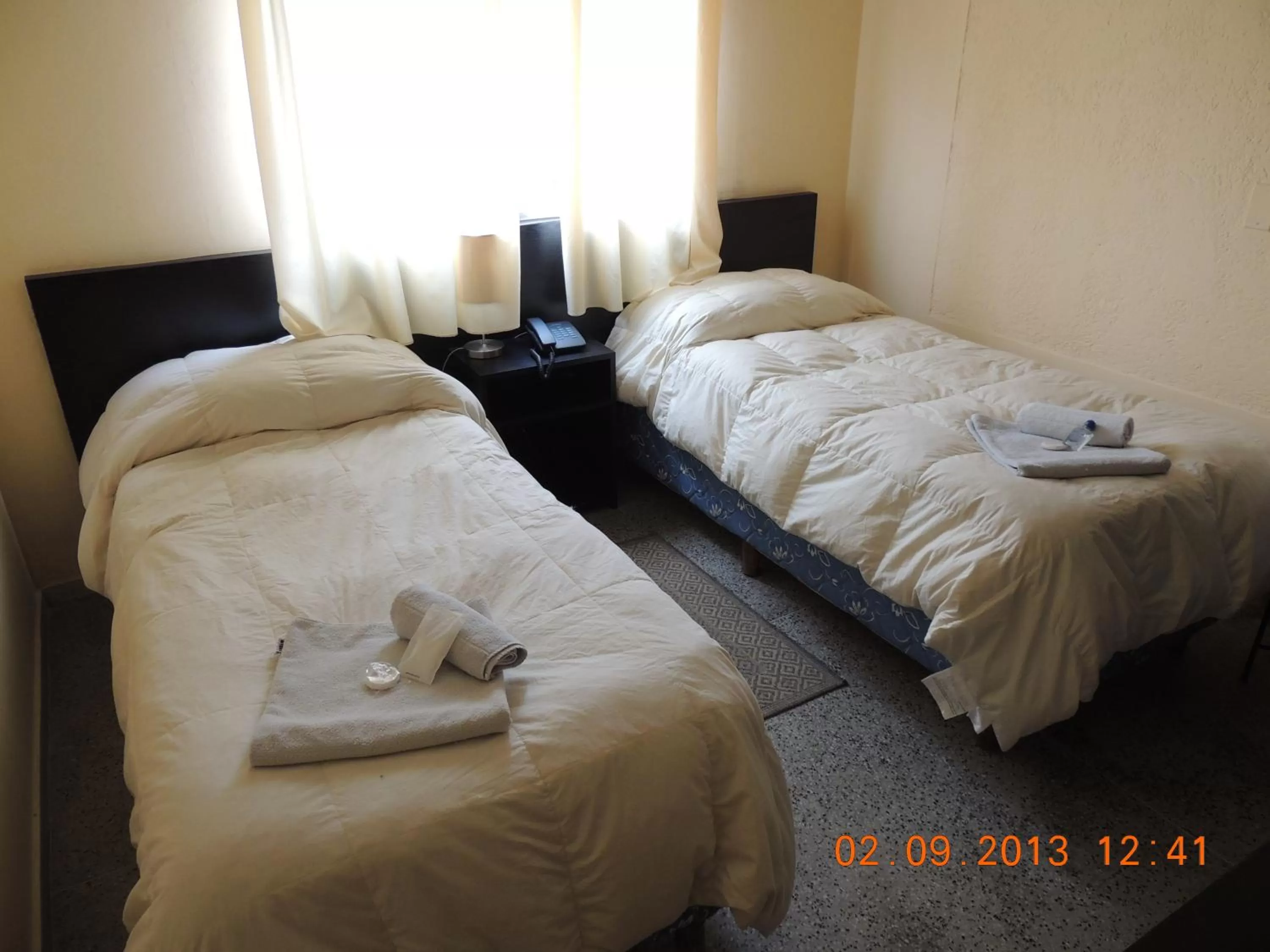 Day, Bed in Hotel Internacional