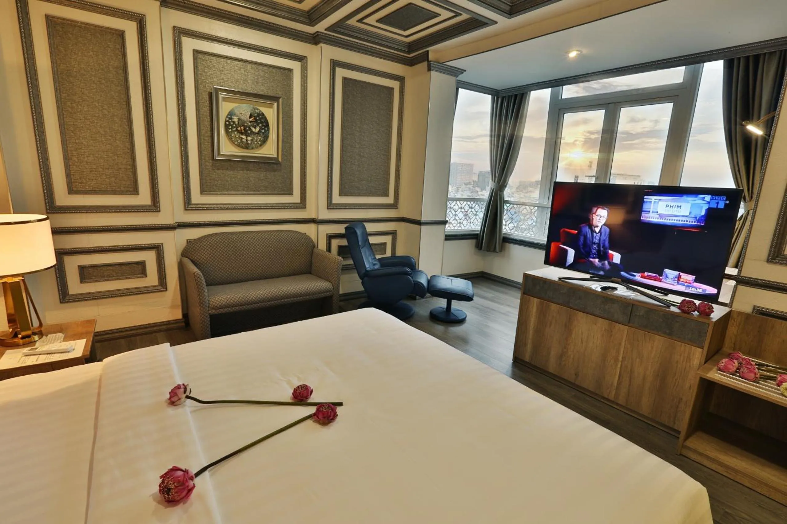 Communal lounge/ TV room in Lotus Saigon Hotel