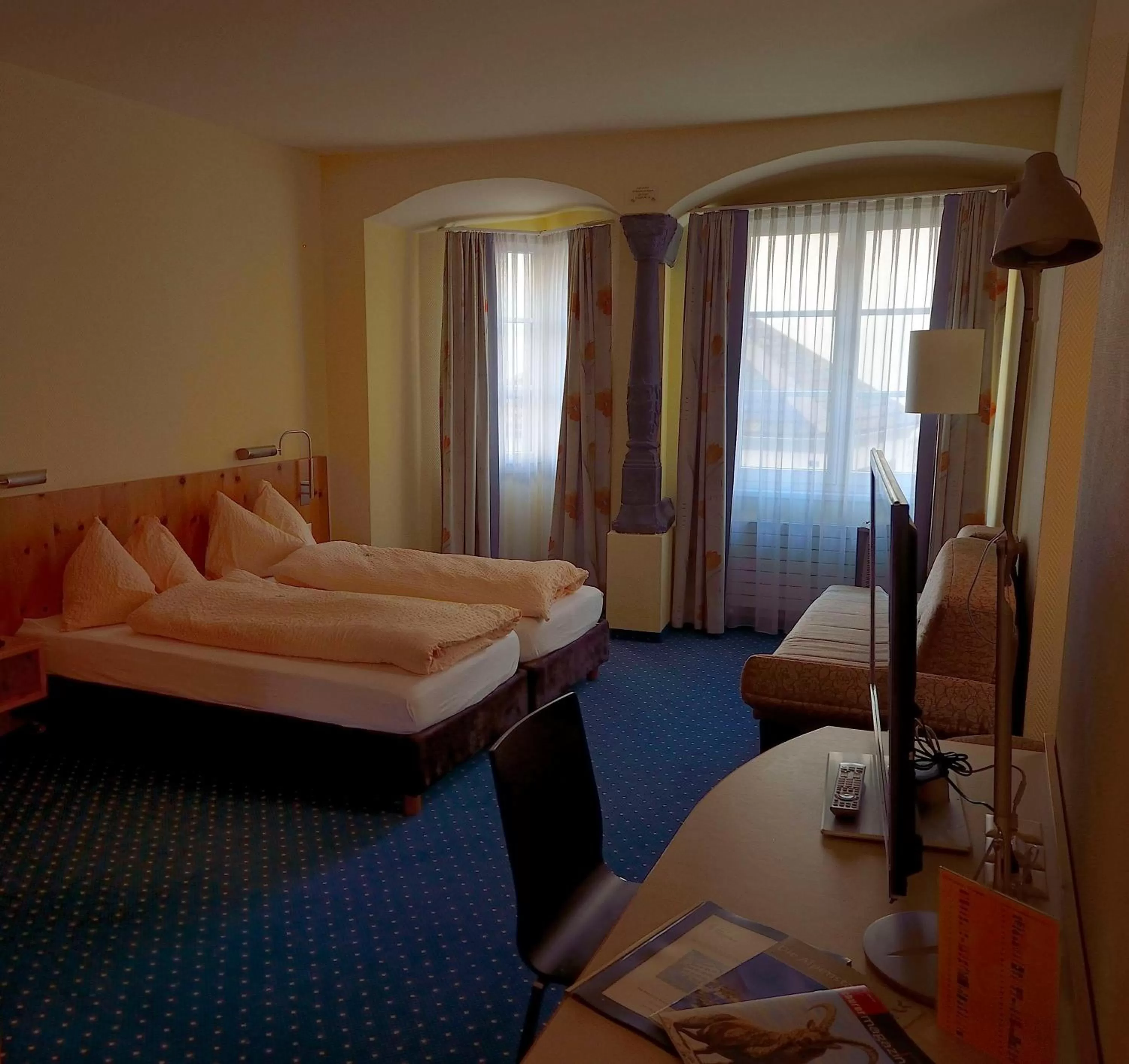 Seating area, Bed in Ambiente Hotel Freieck