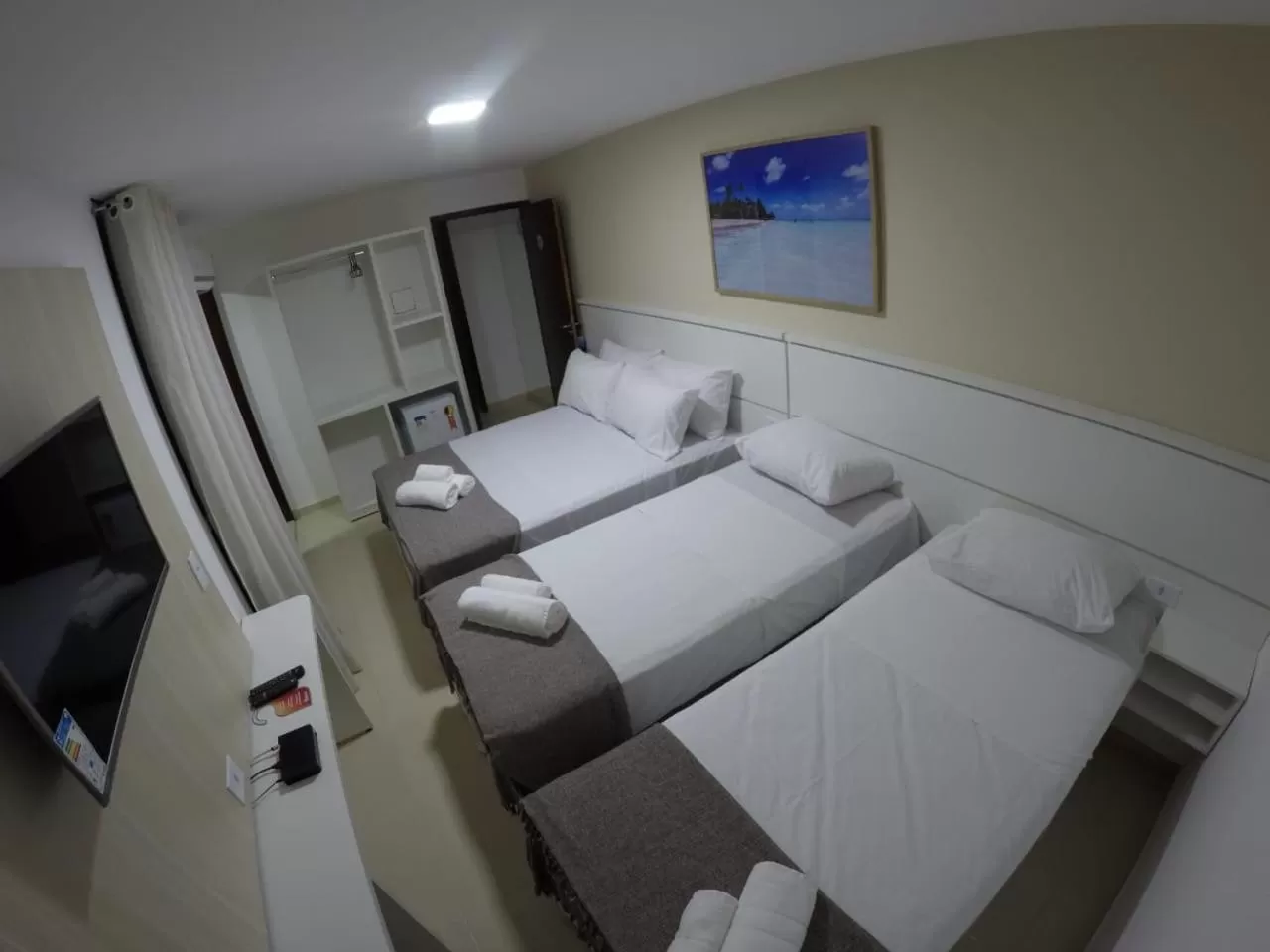 Bed in Pousada Kanoas