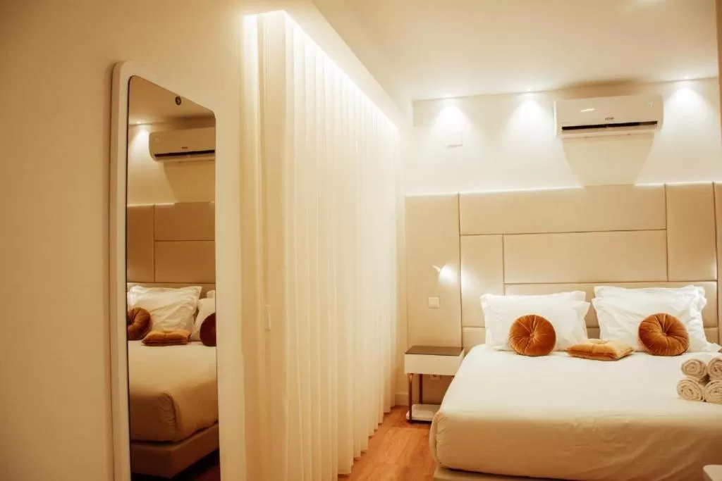 Bedroom, Bed in Le Premier Lisbon Suites