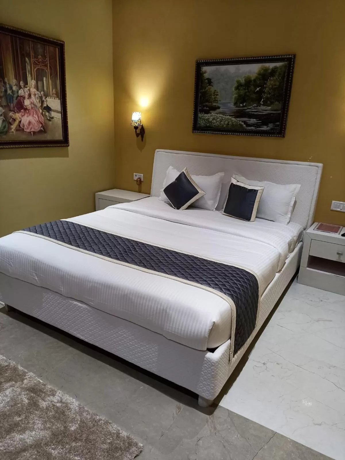 Bed in Sangam Inn & Banquets