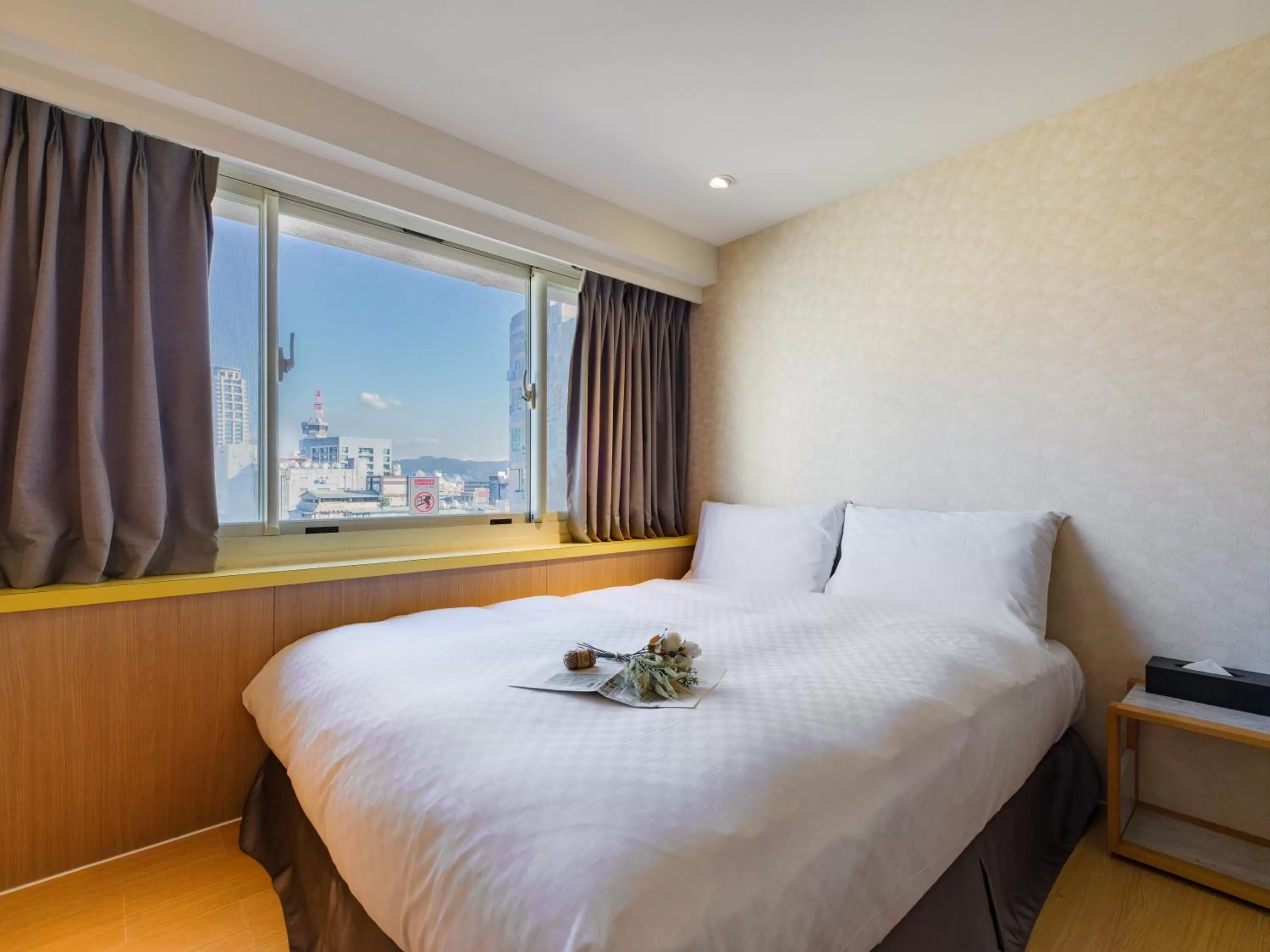 Bed in Ximenhotel-Xining西門大飯店-西寧館