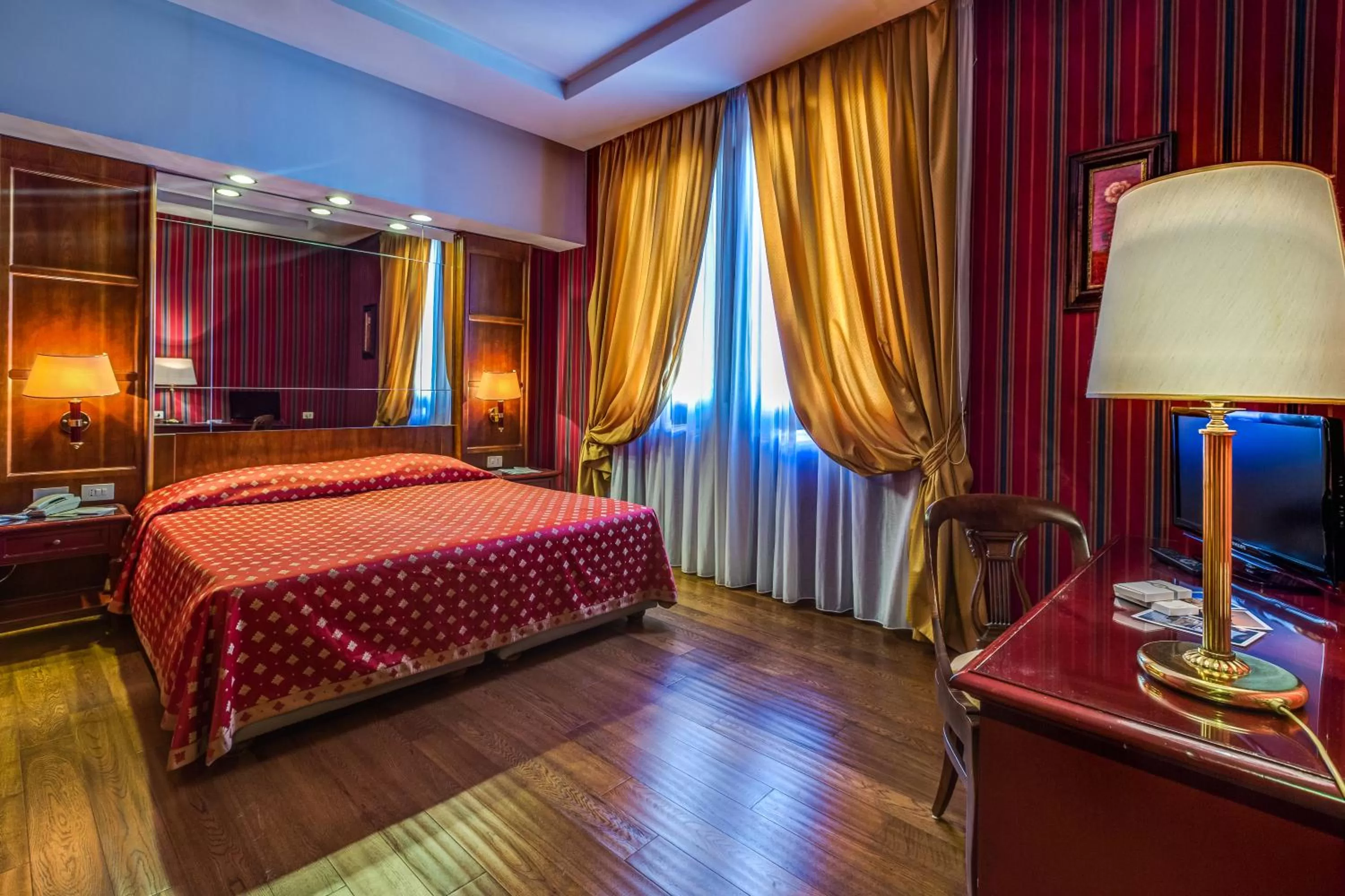Bed in Atlante Garden Hotel