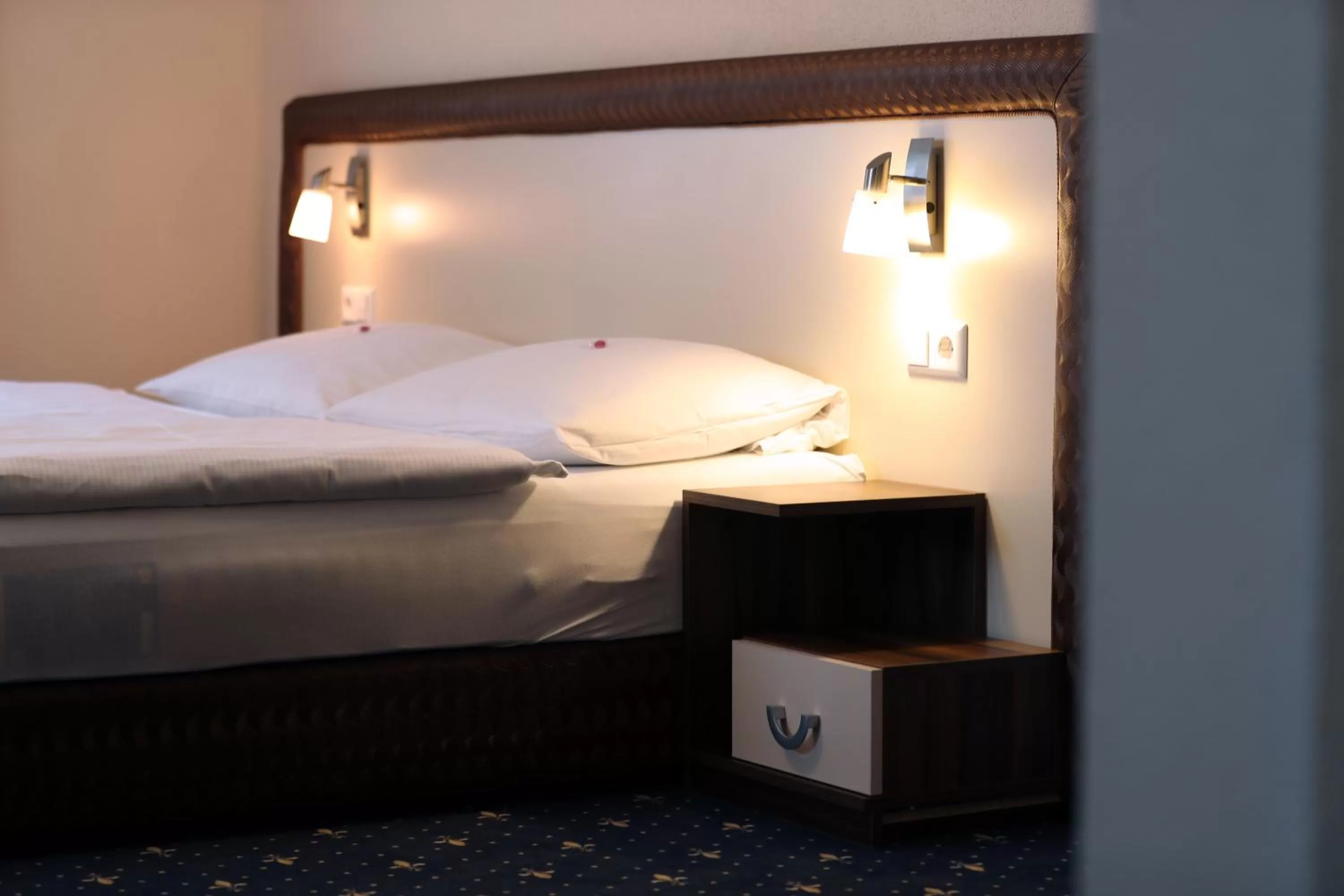 Bed in stadthotel miya