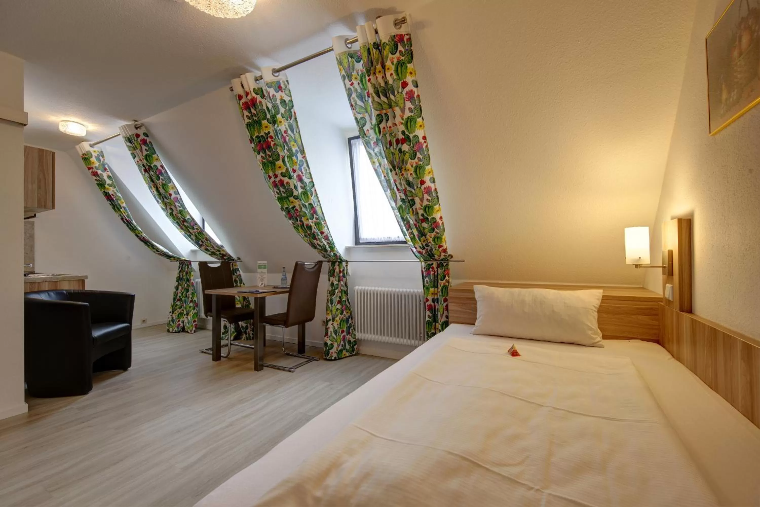 Bed in Aparthotel Deutschmeister