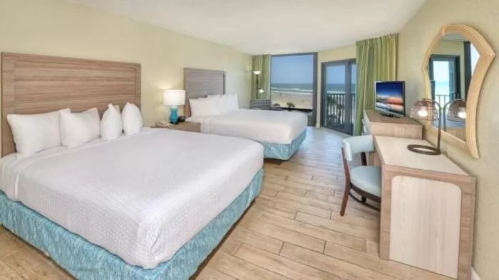 Bedroom, Bed in El Caribe Resort and Conference Center