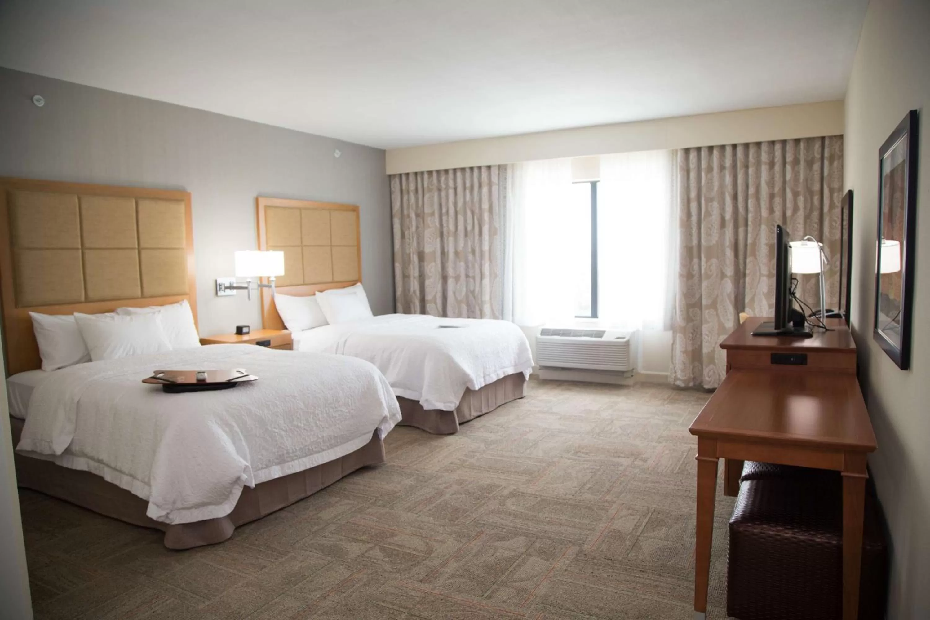 Bed in Hampton Inn and Suites by Hilton McKinney