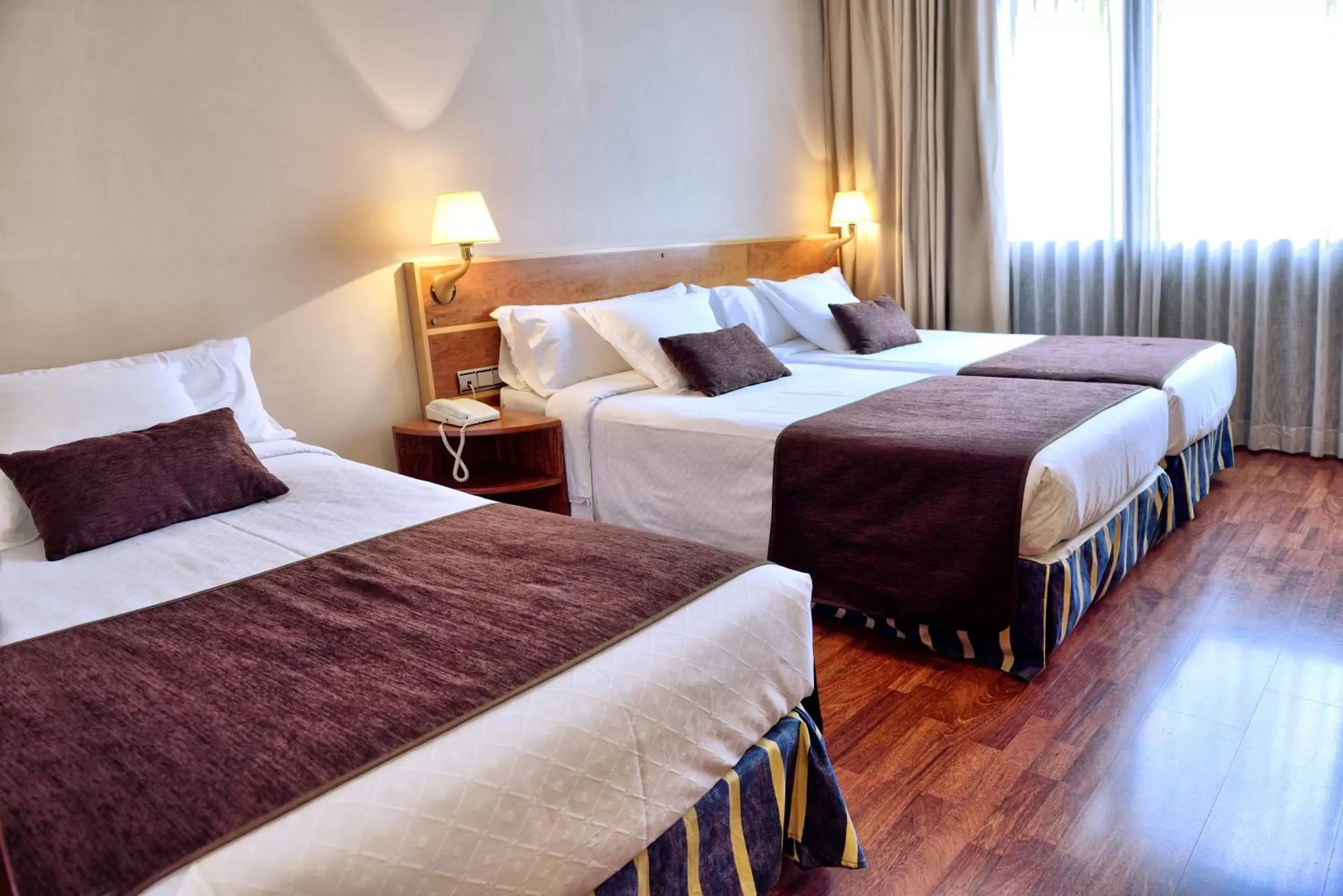 Triple Room in Hotel HLG CityPark Pelayo Triple Room in Hotel HLG CityPark Pelayo