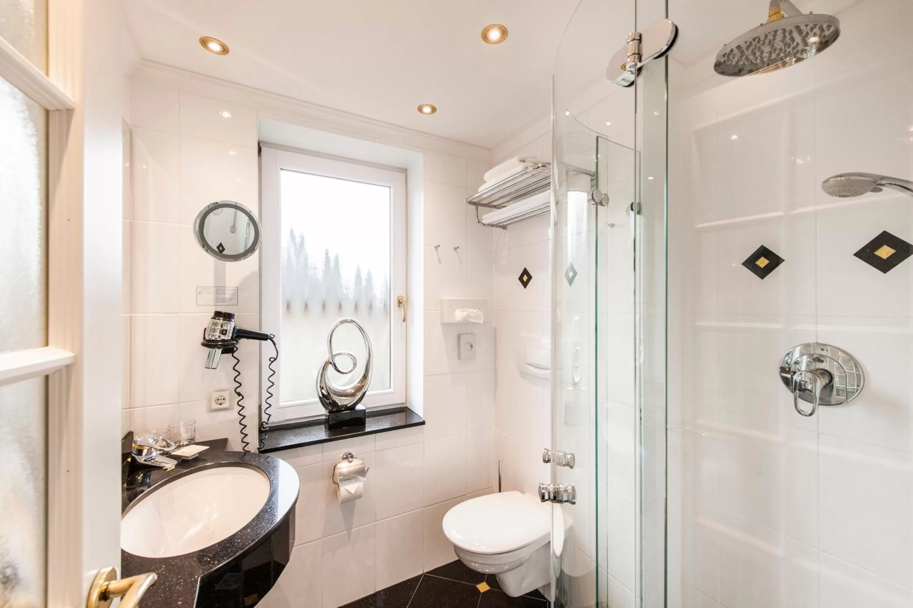 Bathroom in Hotel Apartments Büngers - Mein Refugium am Meer mit Sommerstrandkorb