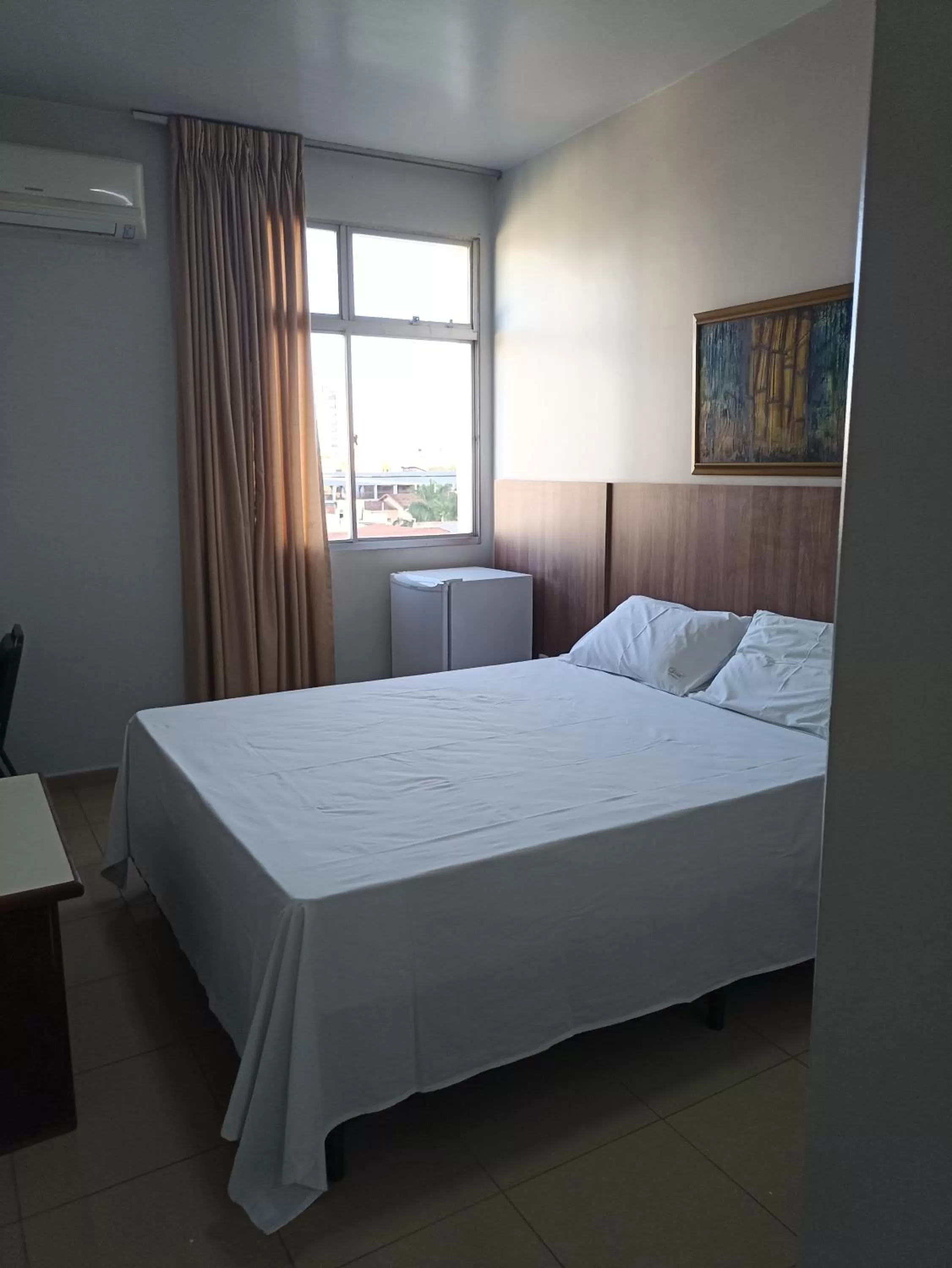 Bed in Hotel Oscar Econômico