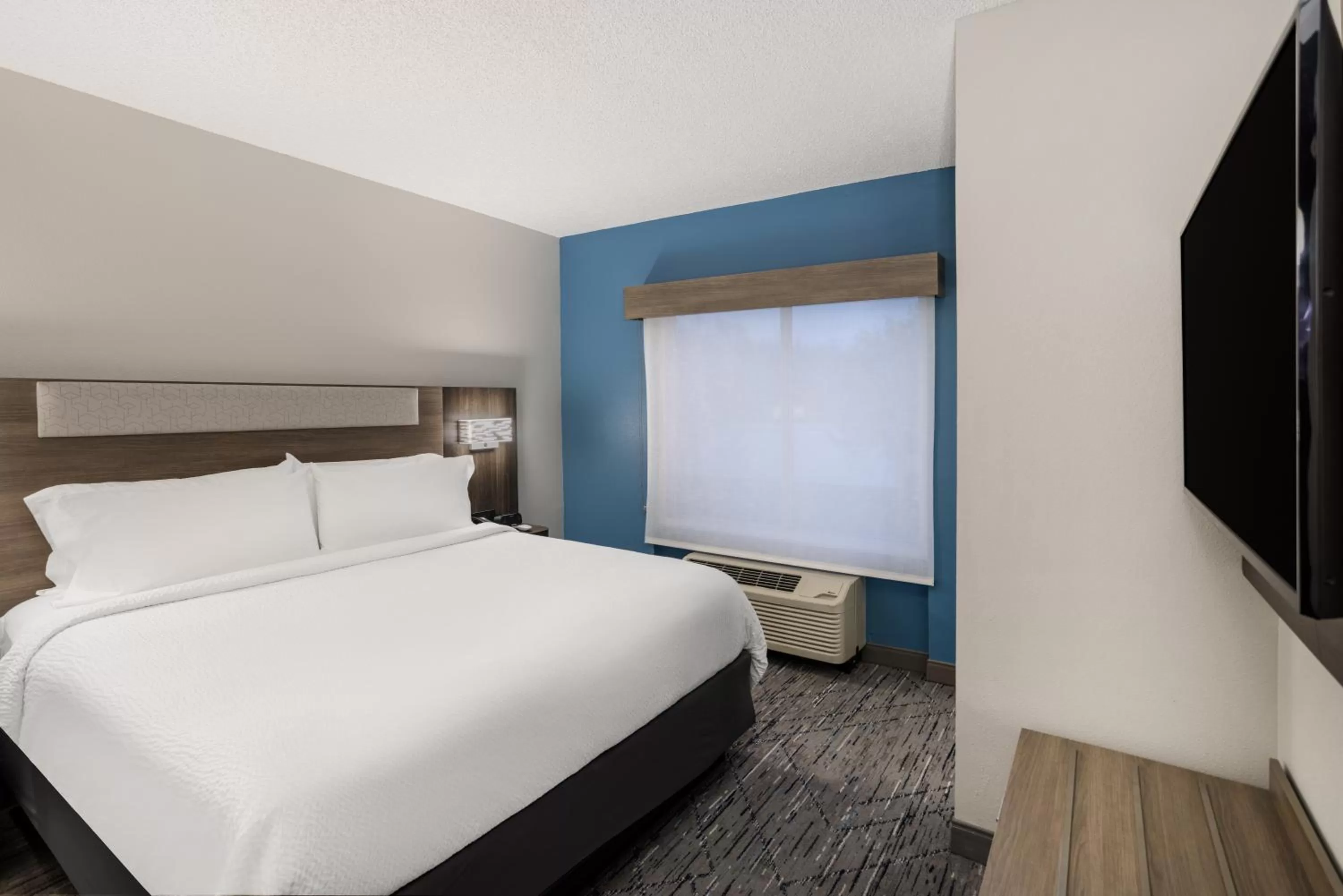 Bedroom, Bed in Holiday Inn Express and Suites Tampa I-75 at Bruce B. Downs by IHG