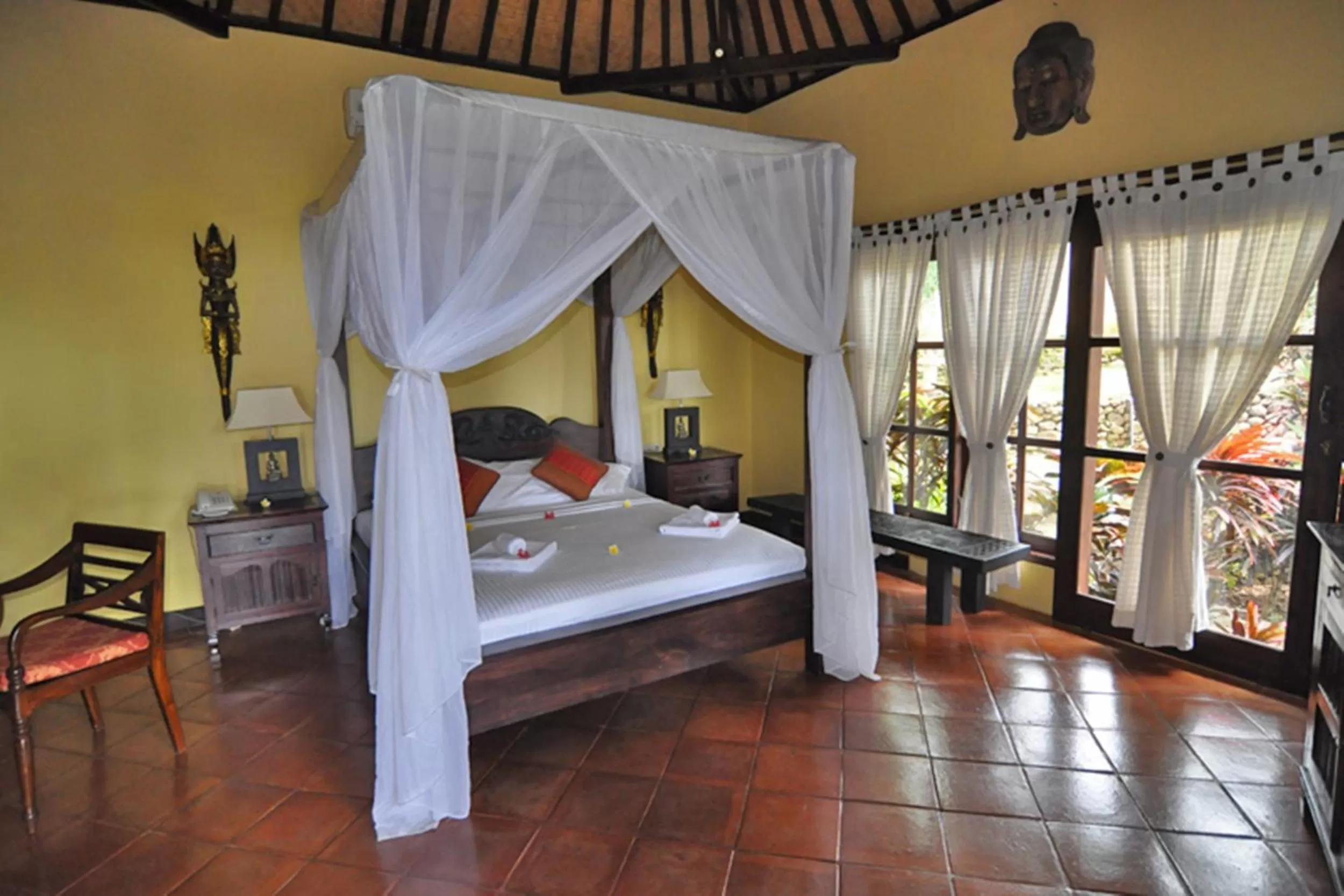 Photo of the whole room, Bed in Puri Mangga Sea View Resort and Spa