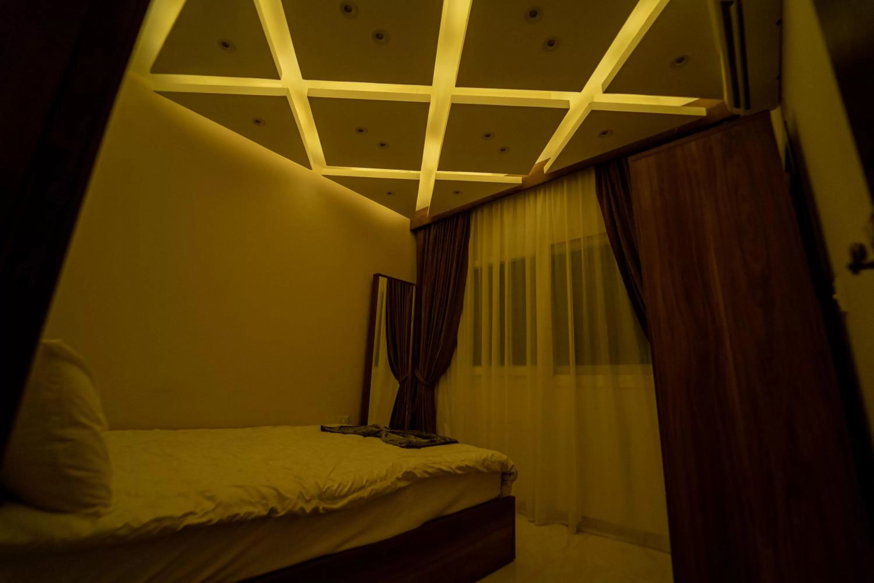 Photo of the whole room, Bed in Gardenia Inn Hotel