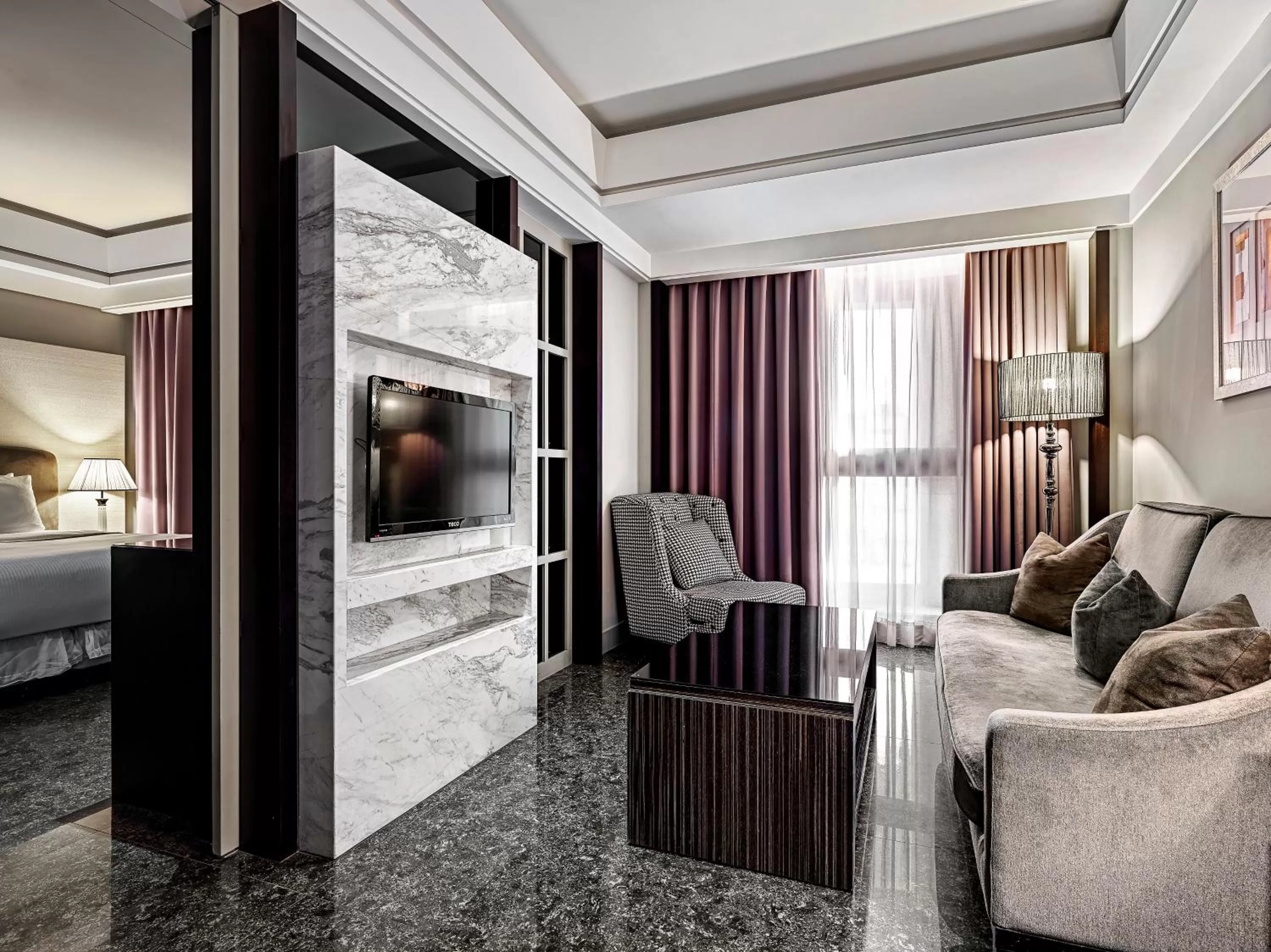 Living room, Bed in Leofoo Residences