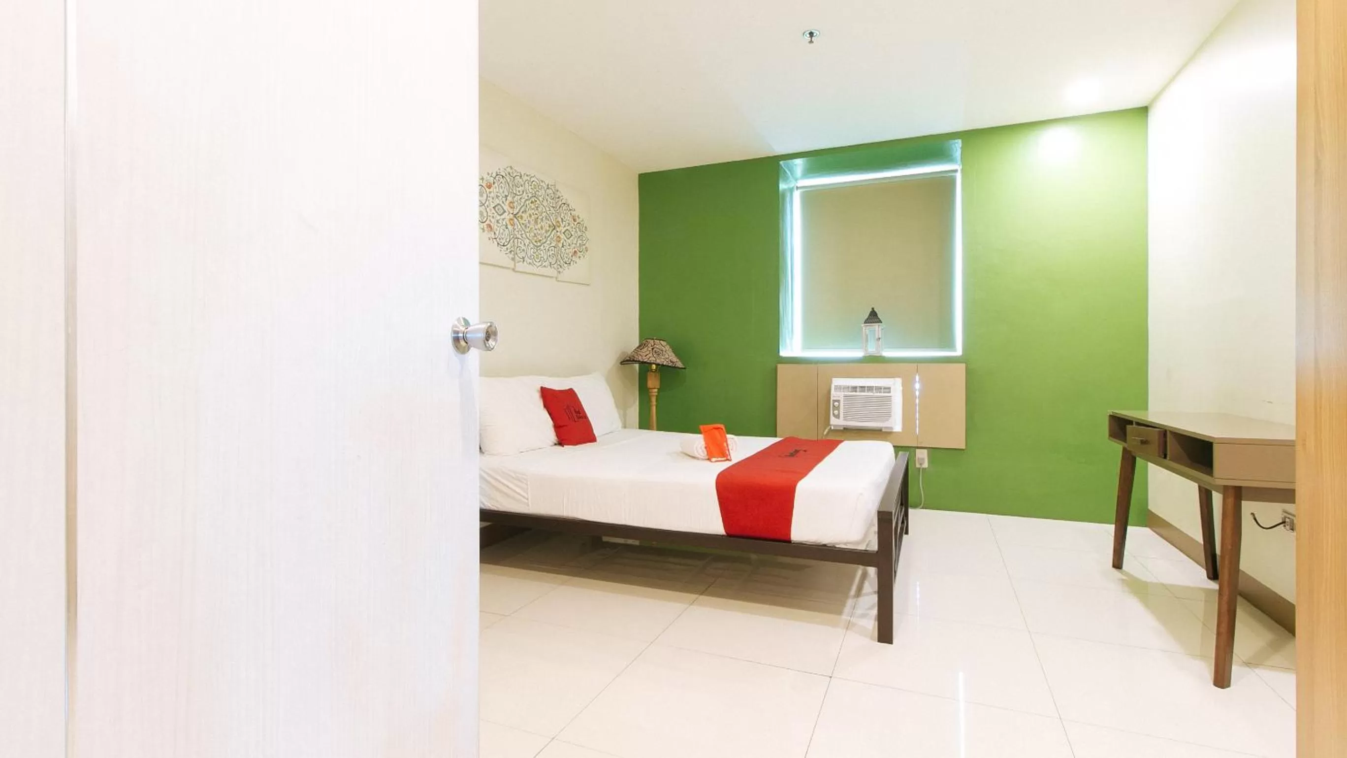 Photo of the whole room, Bed in RedDoorz Plus at Kamuning Quezon City