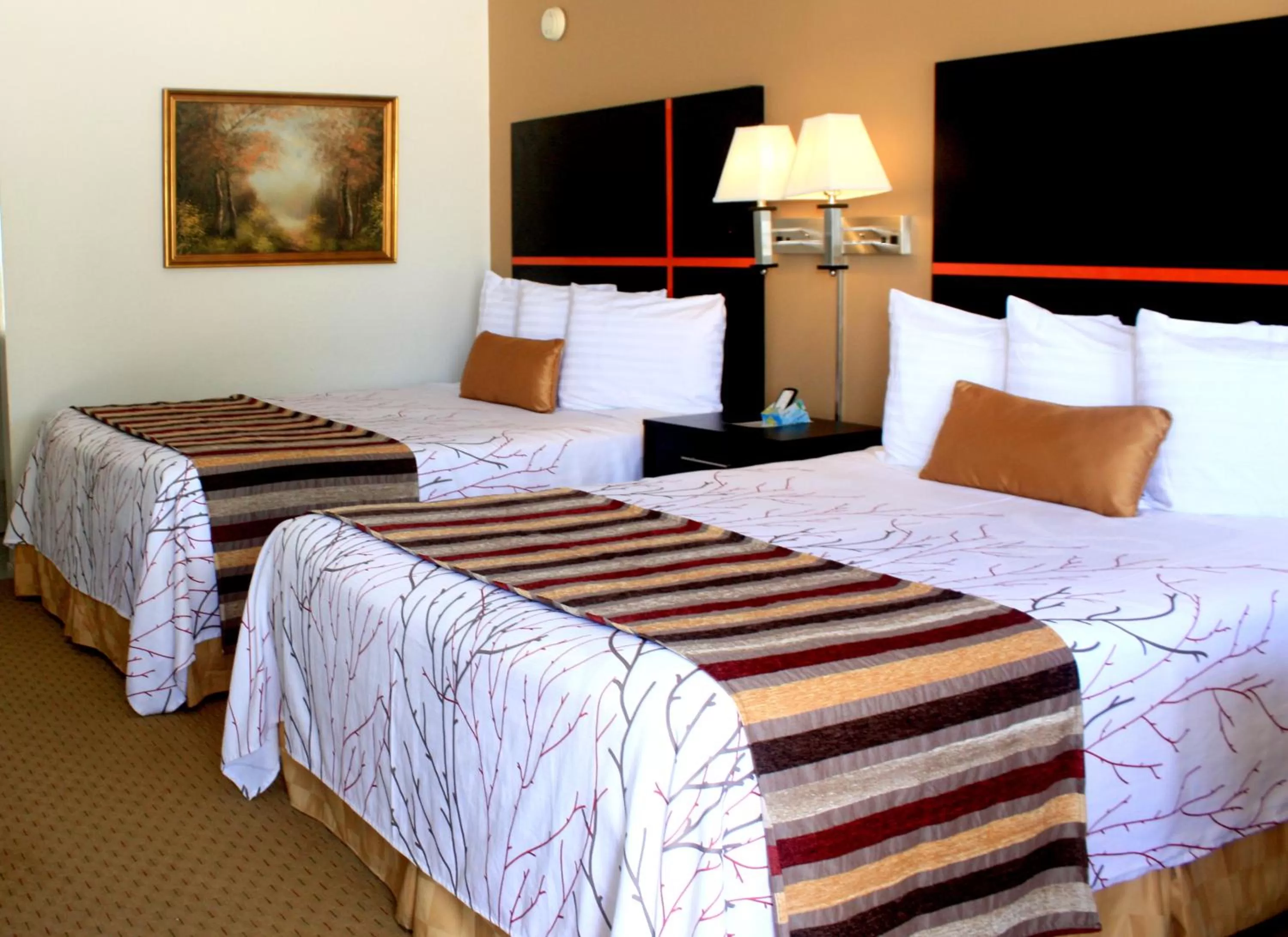 Bed in Chaparral Motor Inn